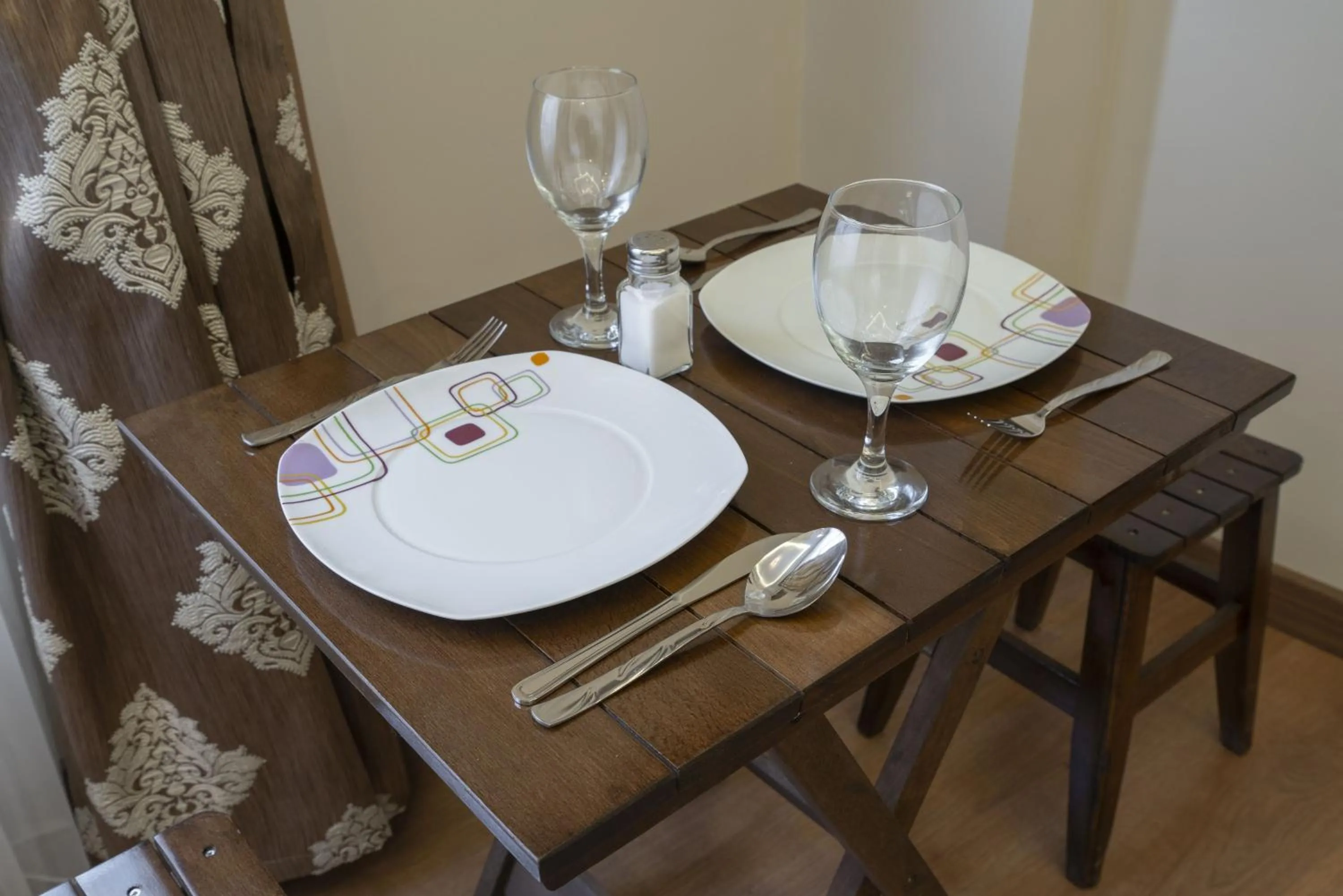 Dining area in Capricorn by Otantik Suites