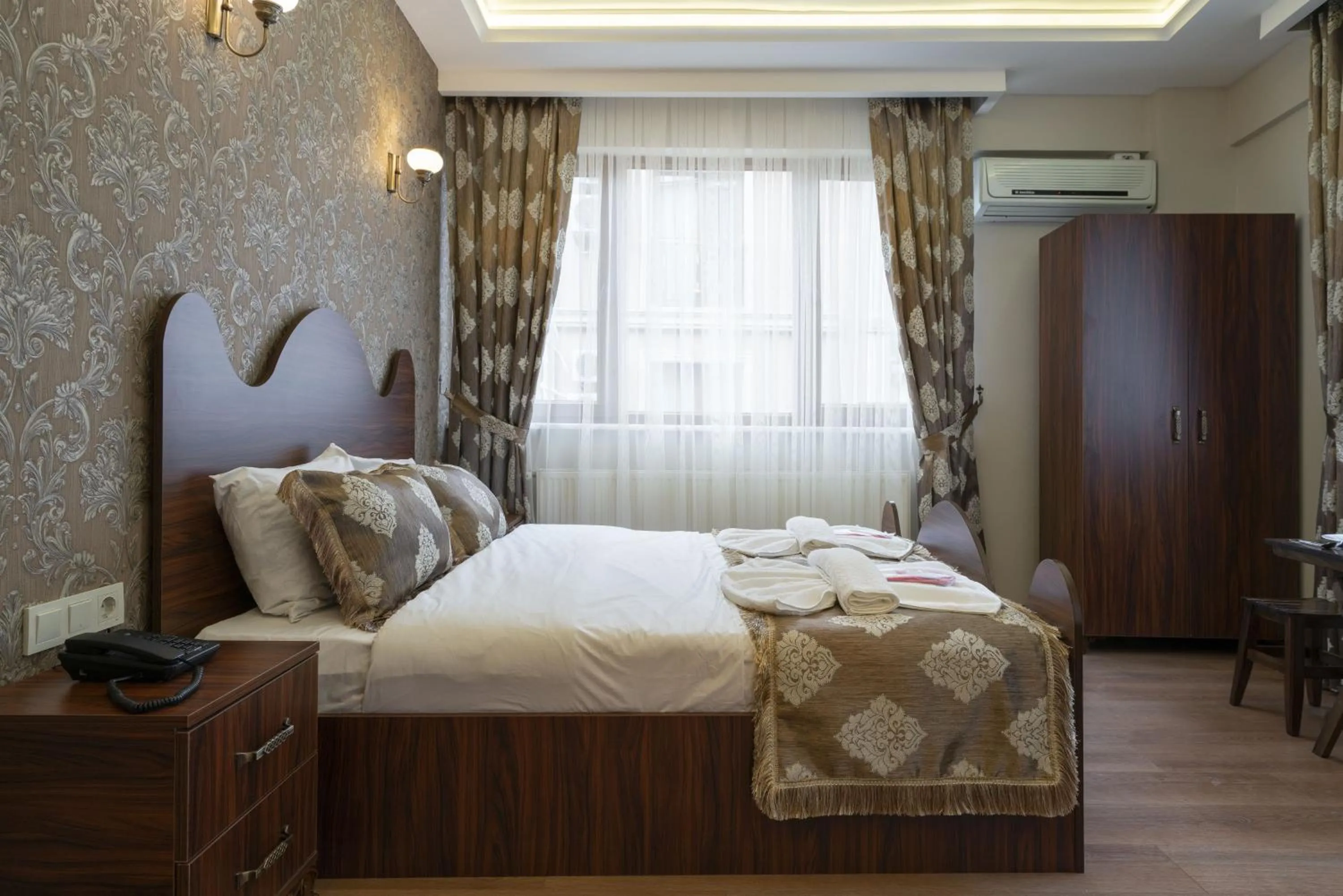 Bedroom, Bed in Capricorn by Otantik Suites
