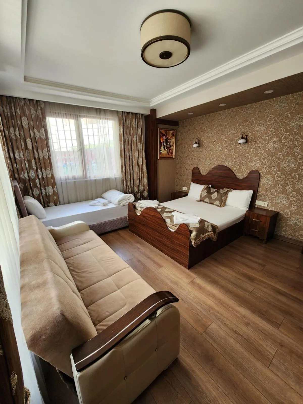 Photo of the whole room, Bed in Capricorn by Otantik Suites
