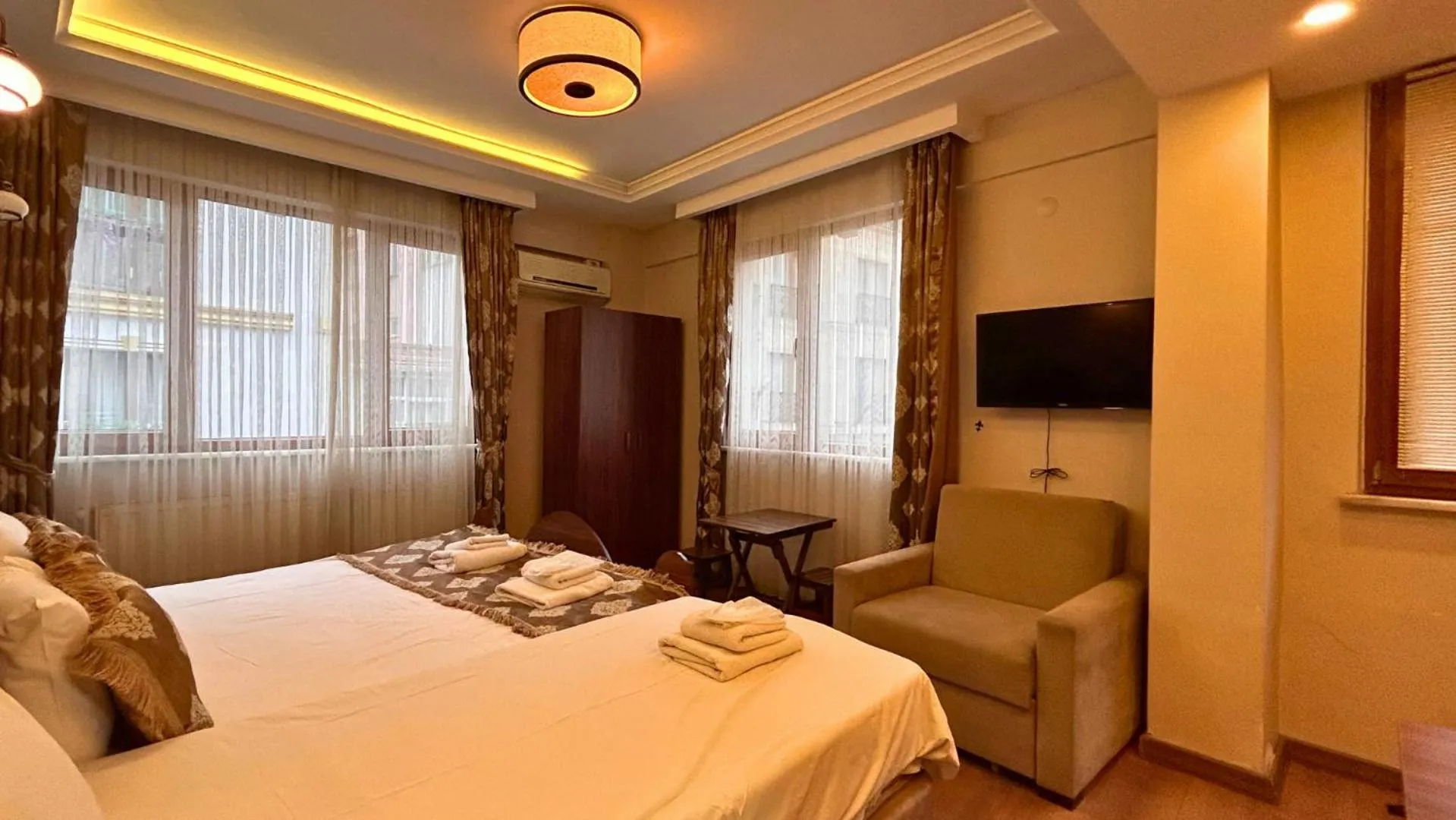 Photo of the whole room, Bed in Capricorn by Otantik Suites