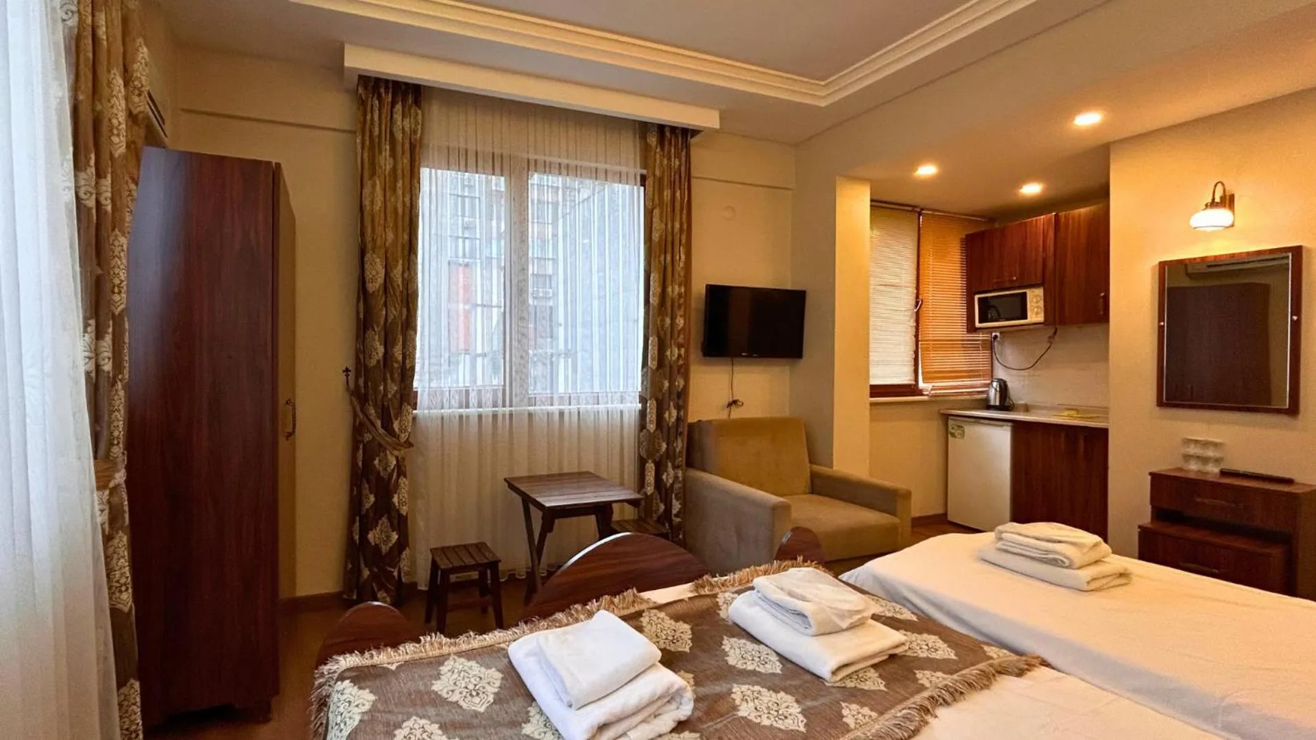 Photo of the whole room, Bed in Capricorn by Otantik Suites