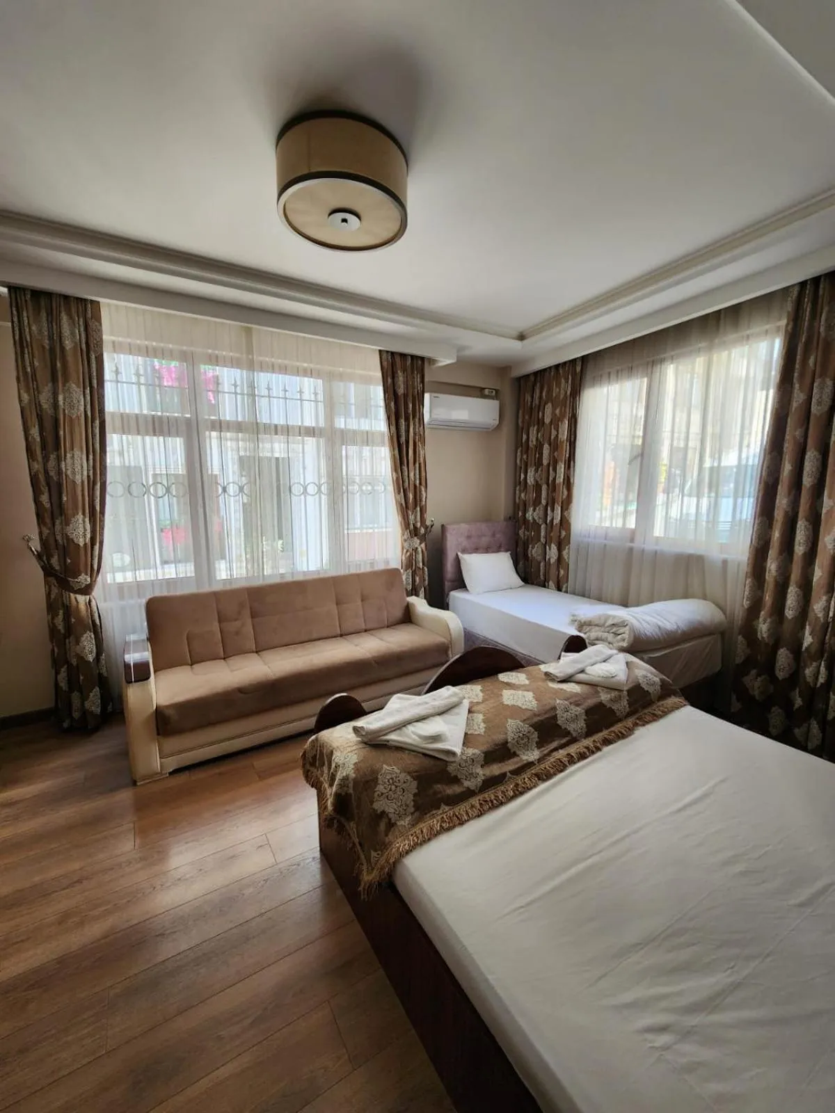 Photo of the whole room, Bed in Capricorn by Otantik Suites