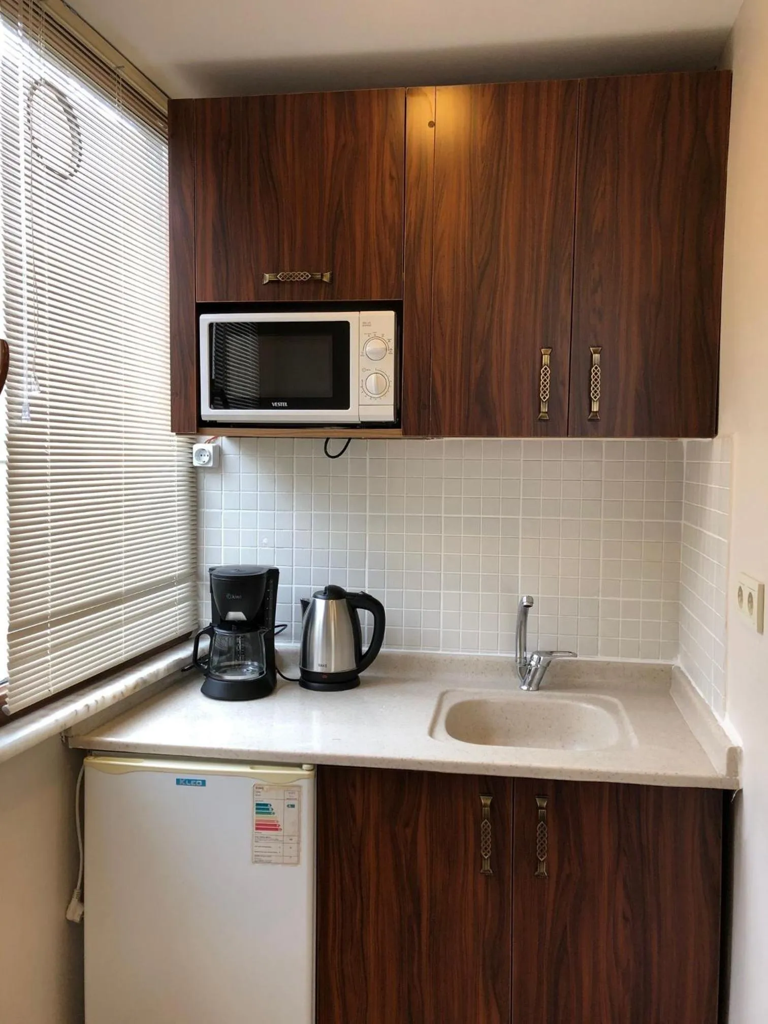 Kitchen or kitchenette in Capricorn by Otantik Suites