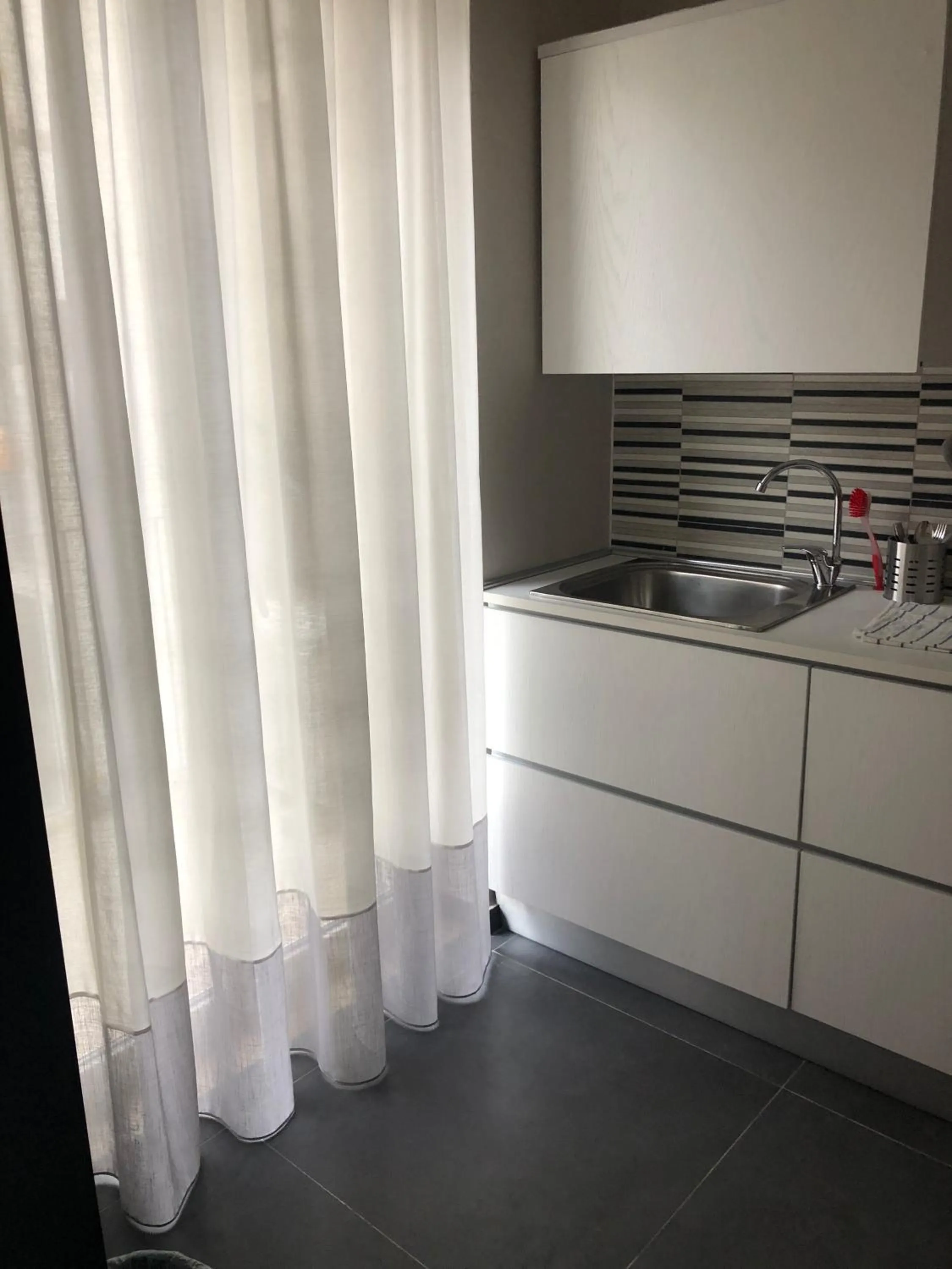 Kitchen or kitchenette in Re di Smirne by Apulia Accommodation