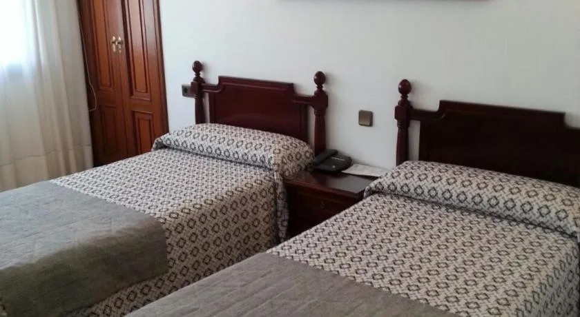 Bed in Hotel Don Pepe