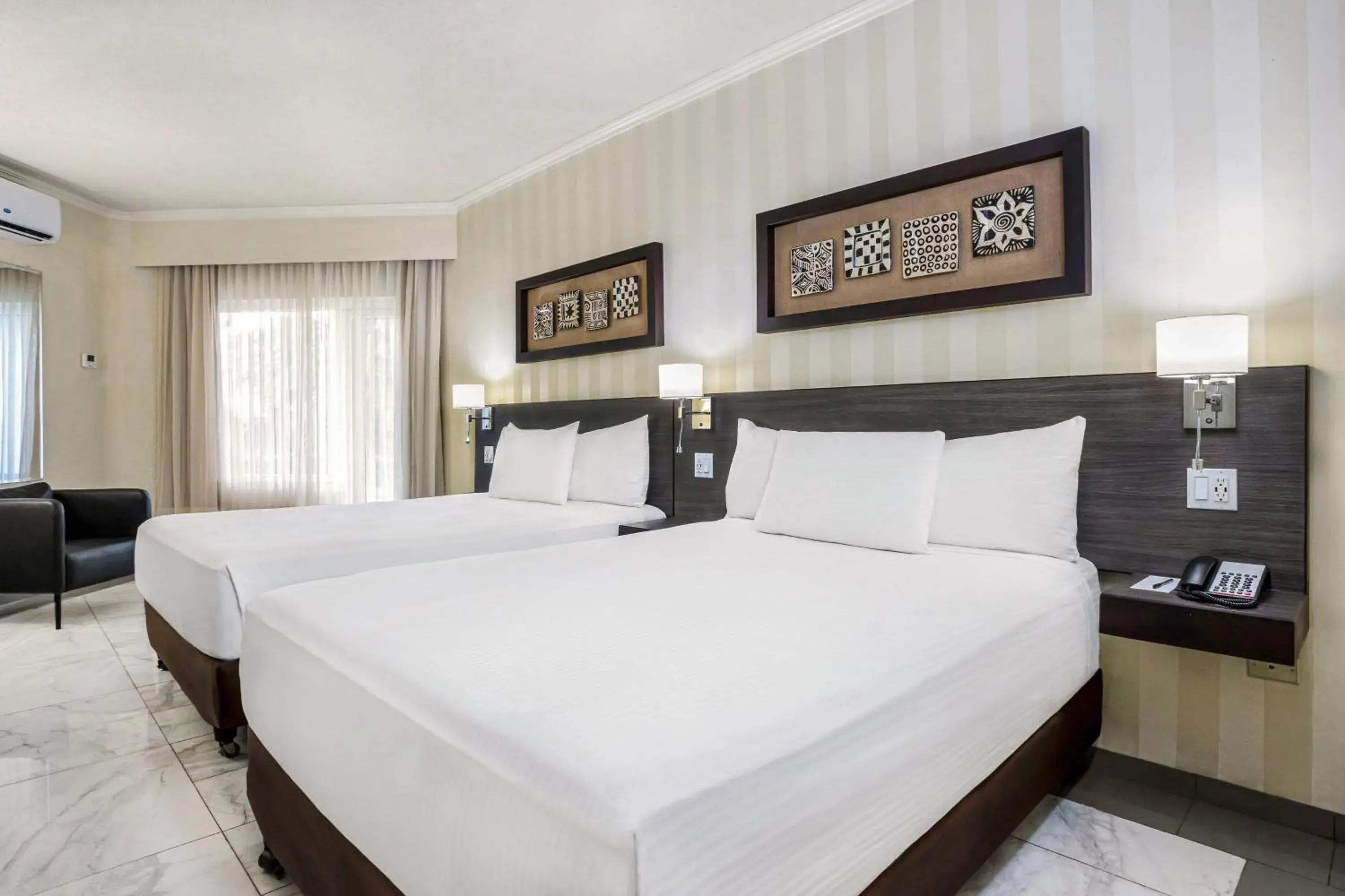 Queen Room with Two Queen Beds in Copantl Hotel & Convention Center Queen Room with Two Queen Beds in Copantl Hotel & Convention Center