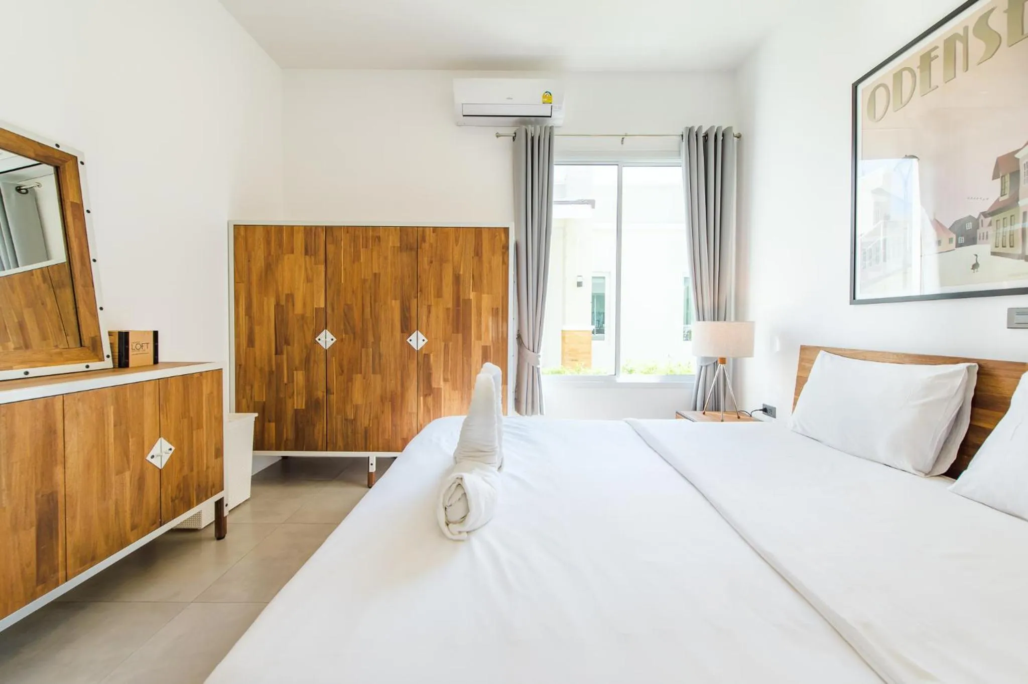 Bed in Oriental Beach Pearl Resort