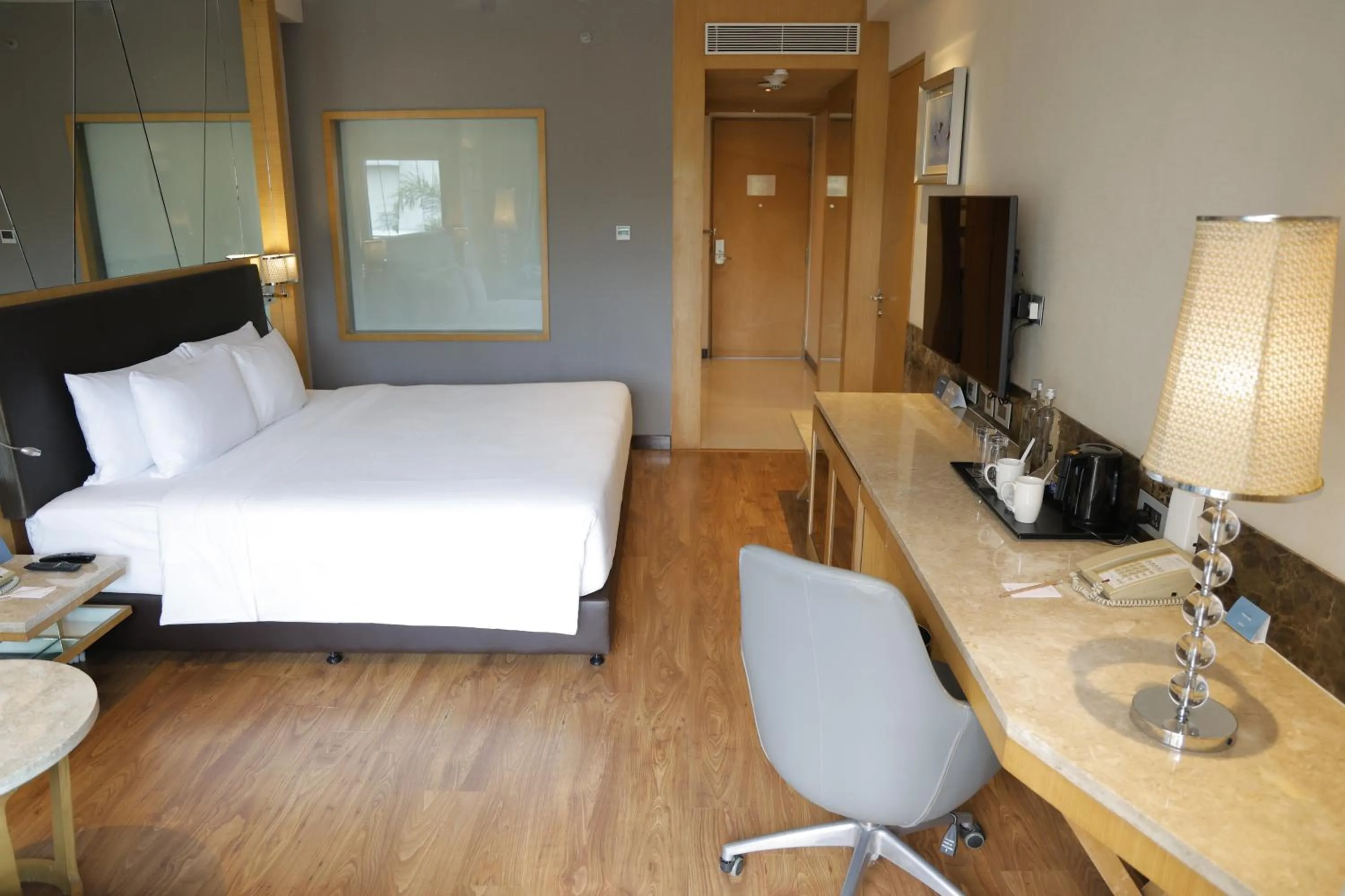 Bed in Radisson Resort & Spa Kandla