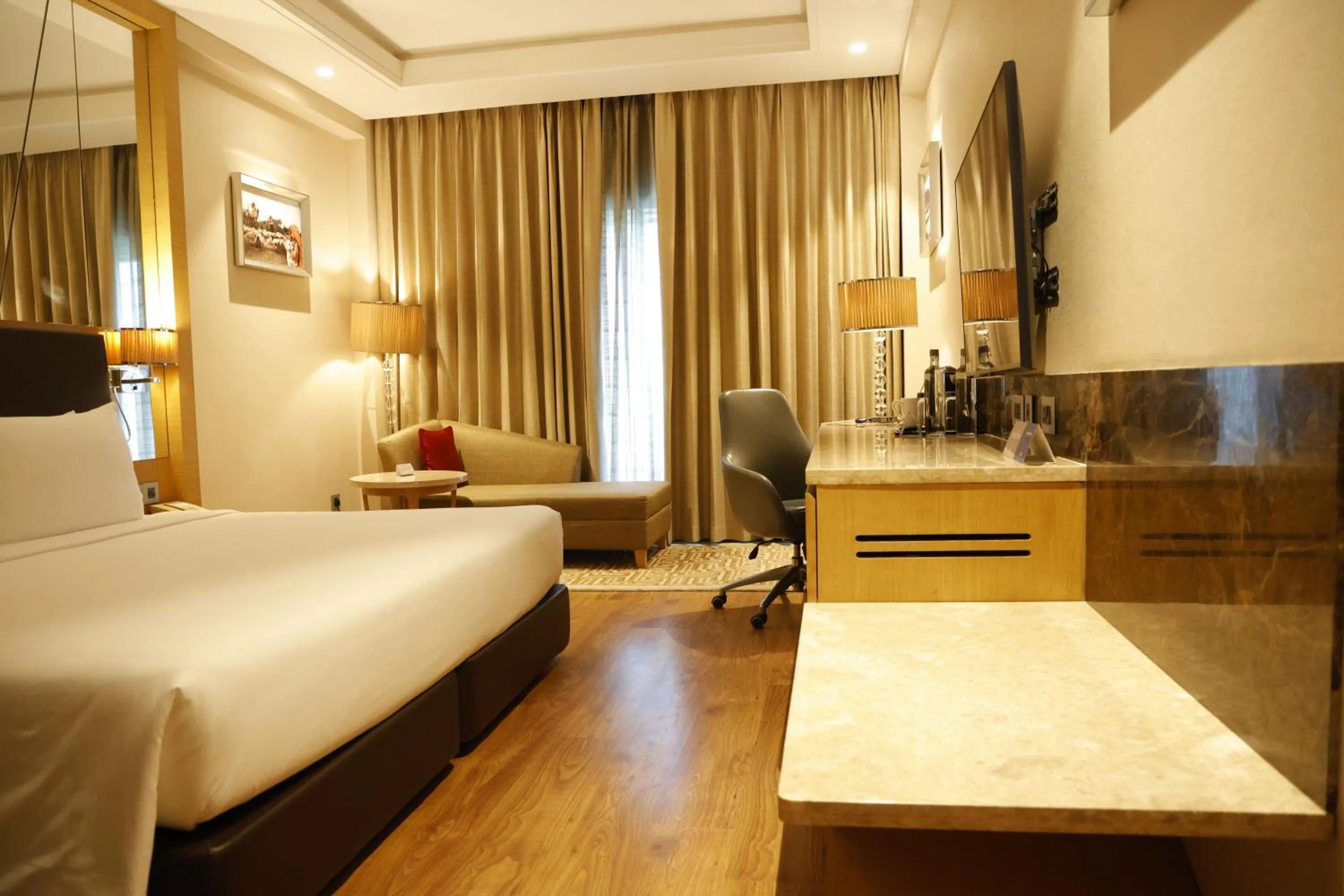 Bed in Radisson Resort & Spa Kandla