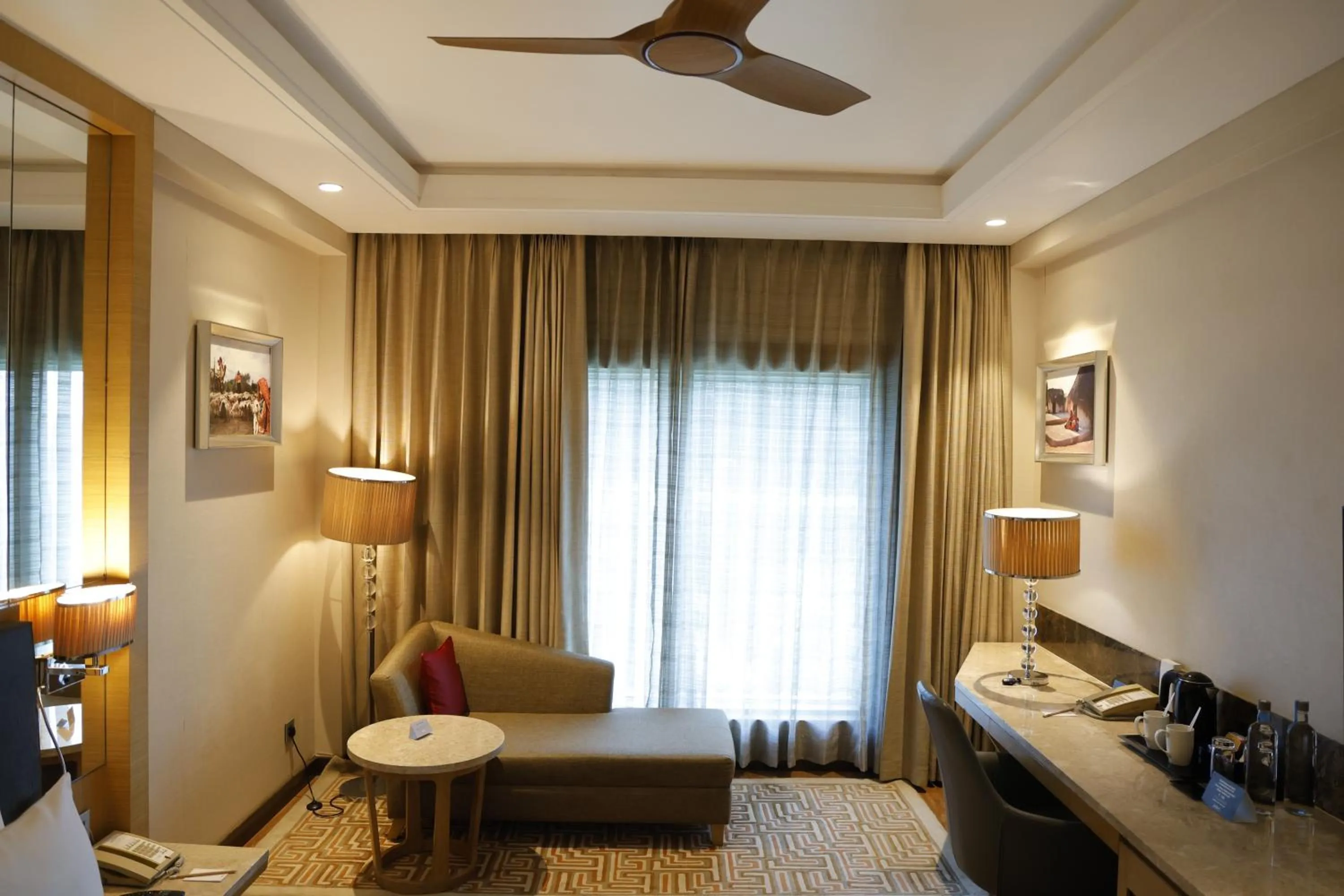 Living room, Bed in Radisson Resort & Spa Kandla