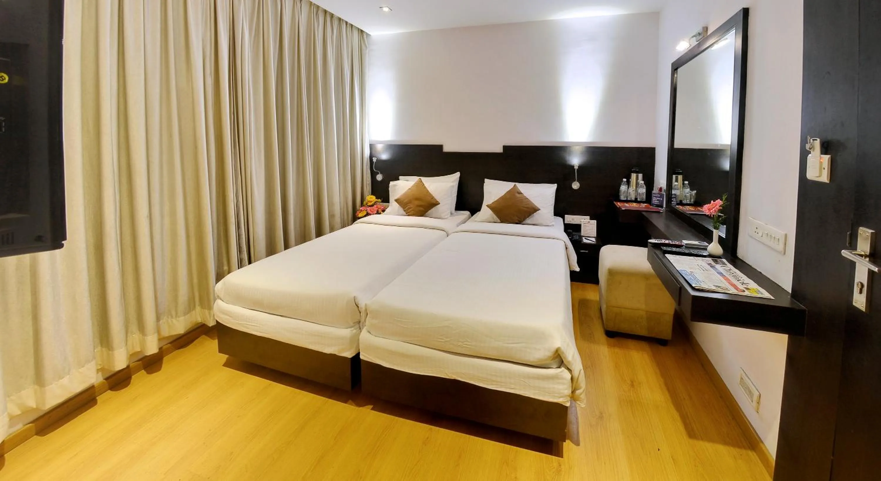 Photo of the whole room, Bed in Hotel Gokulam Park