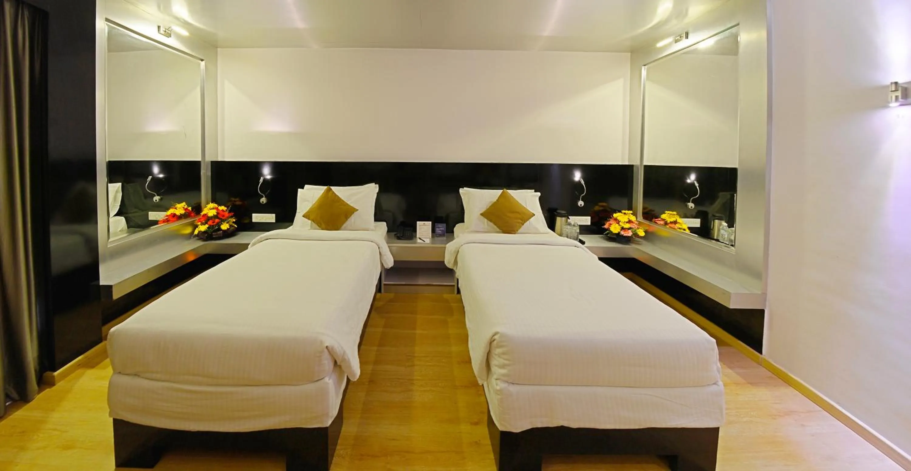 Bed in Hotel Gokulam Park