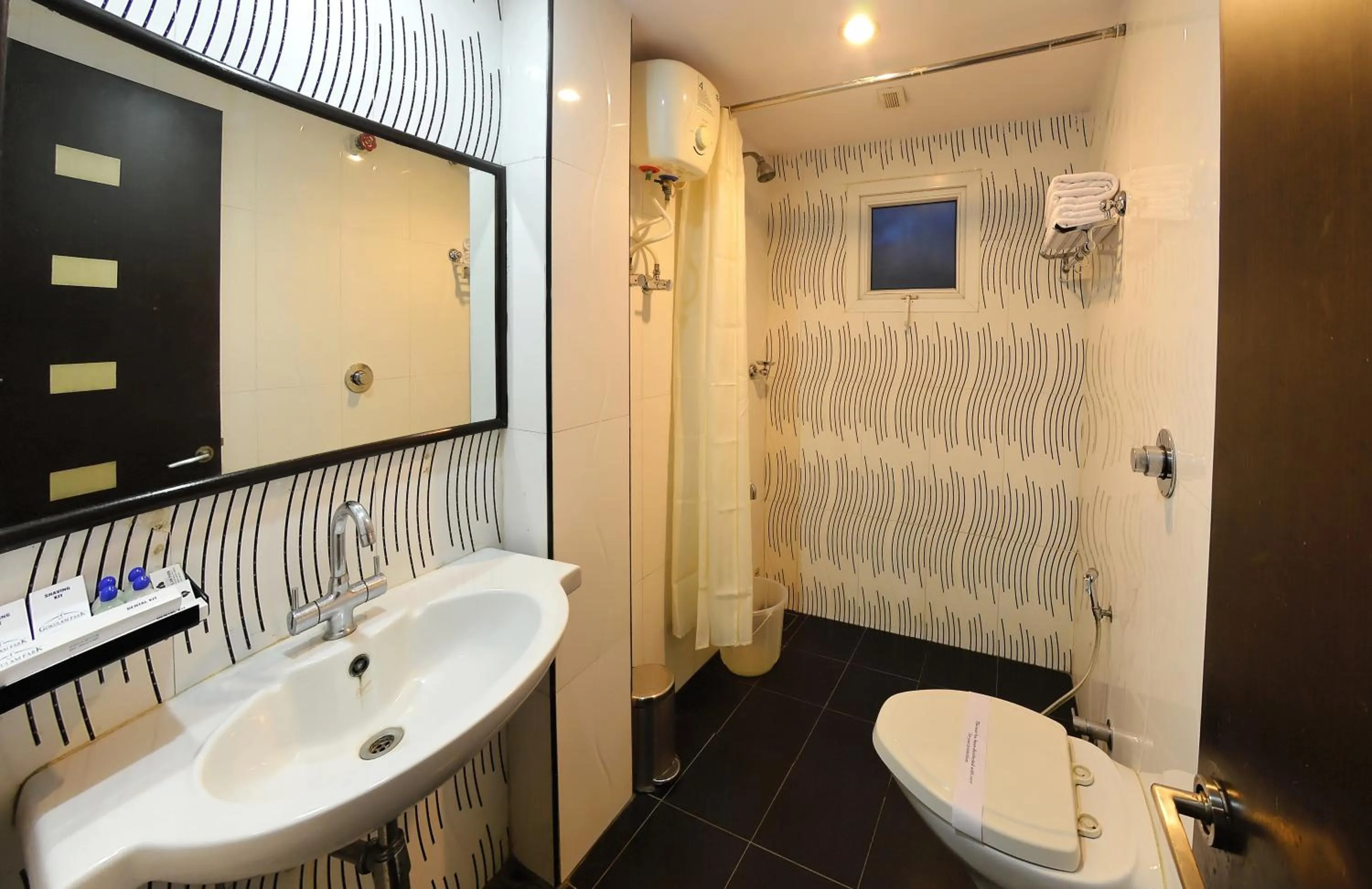 Bed in Hotel Gokulam Park