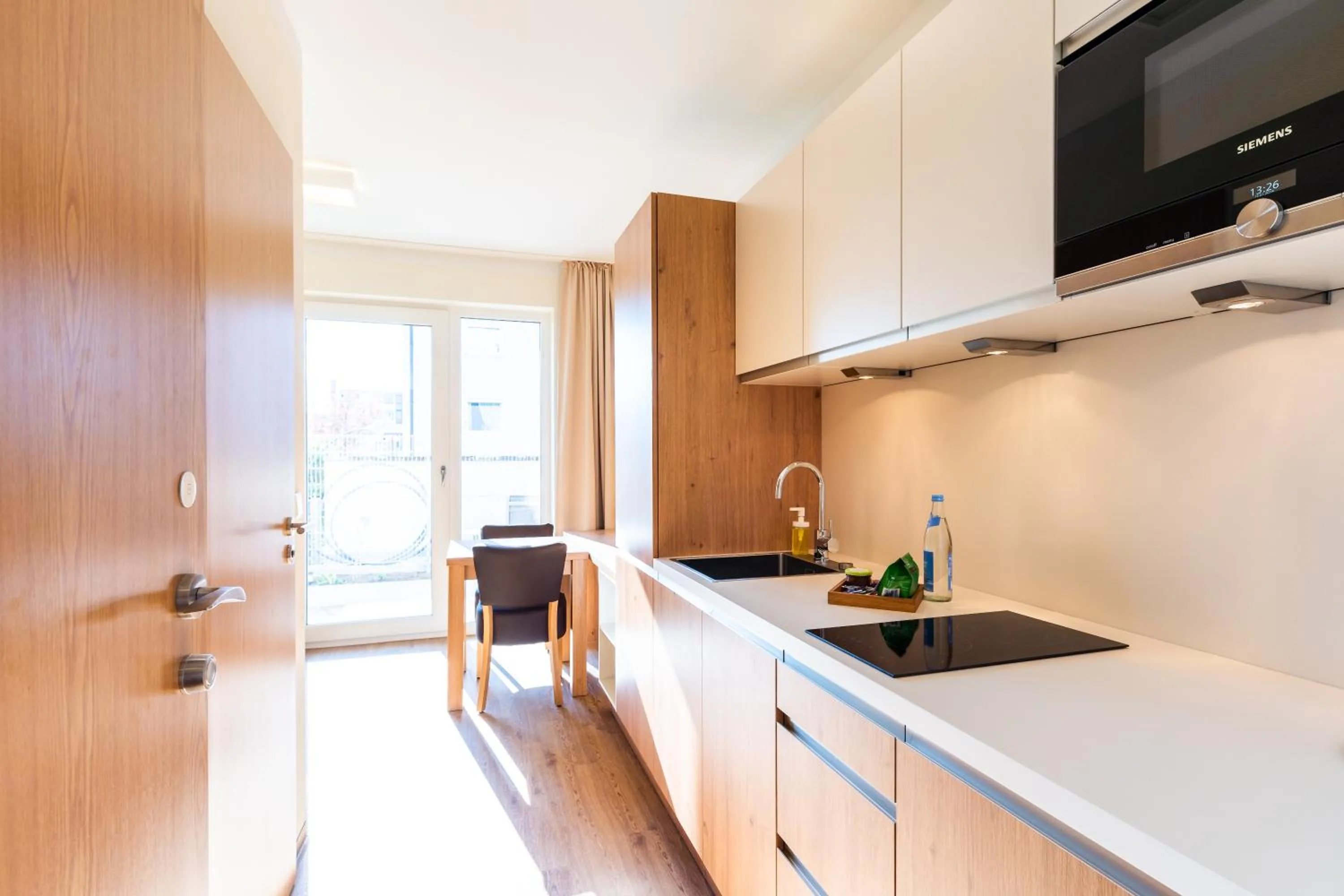 Kitchen or kitchenette in INhouse - Wohnen auf Zeit