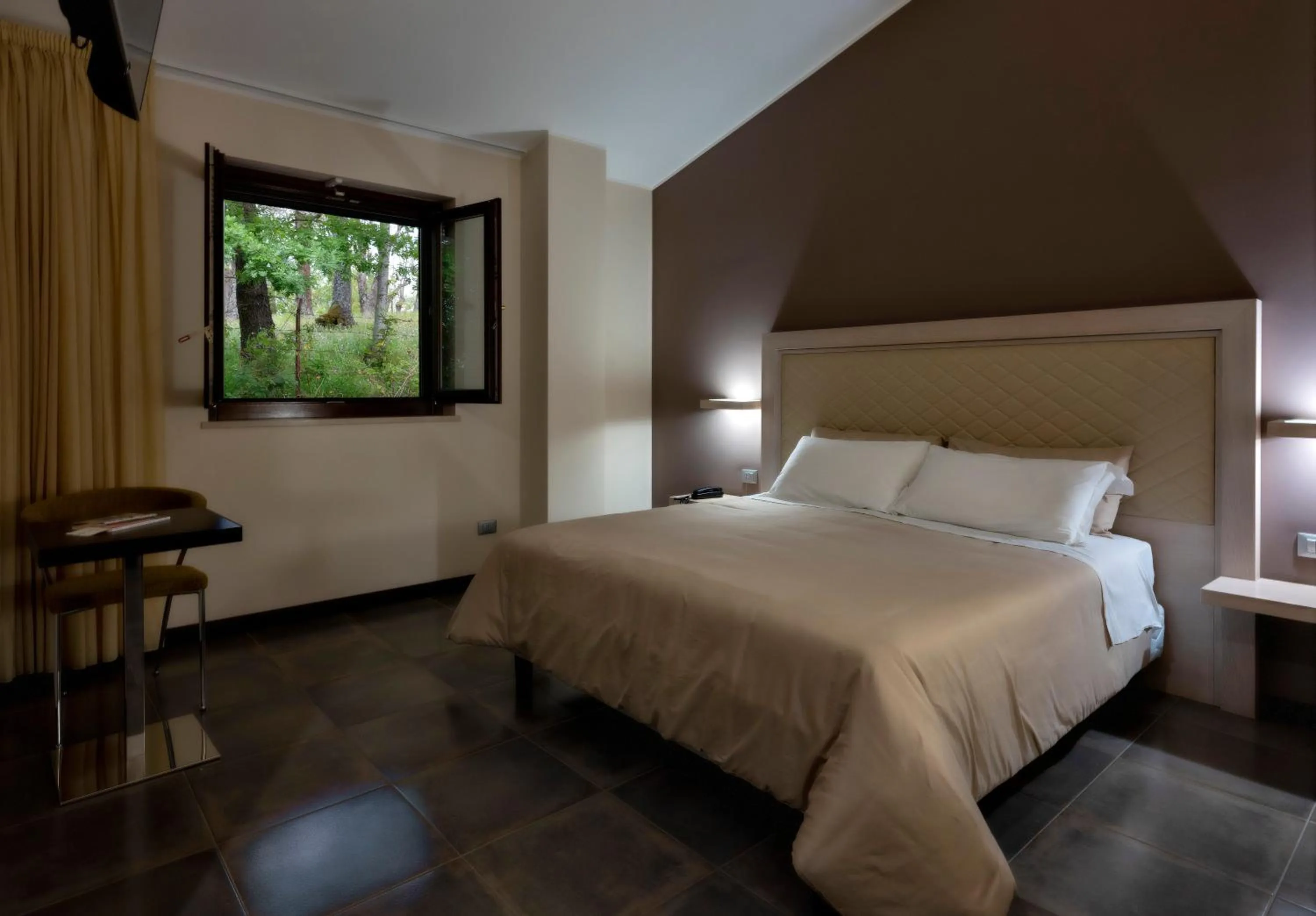 Bed in Il Castagneto Hotel