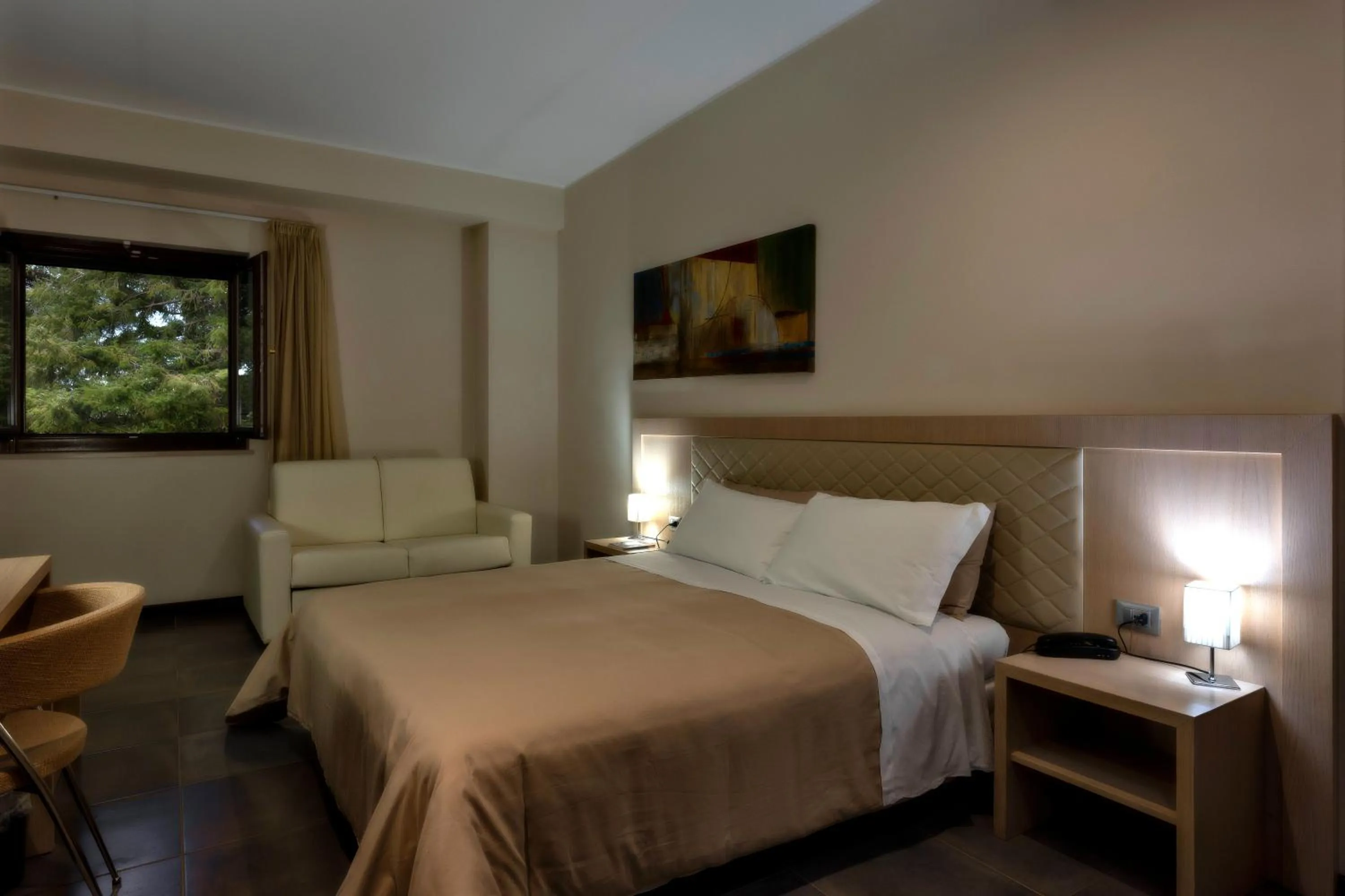 Bed in Il Castagneto Hotel