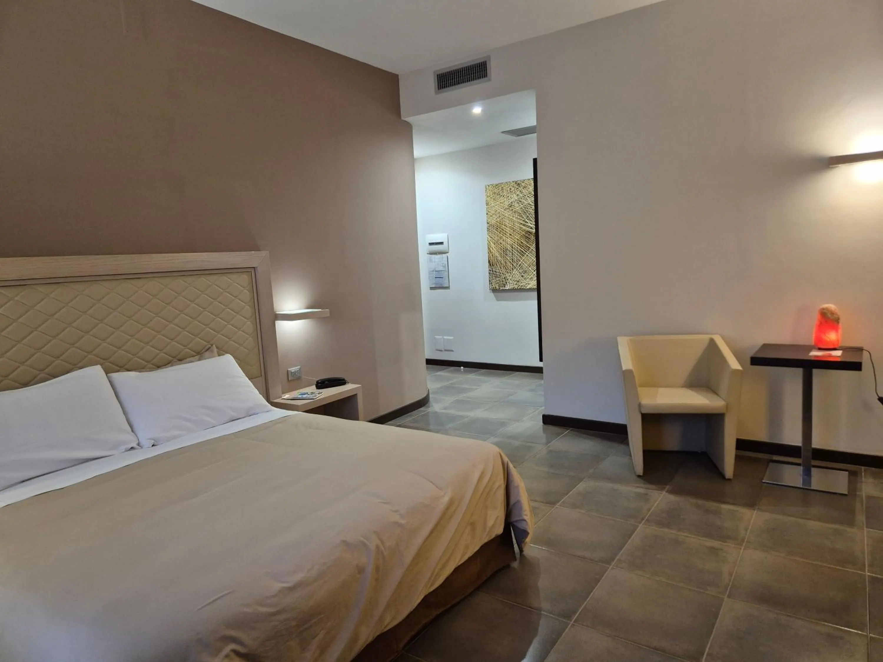 View (from property/room), Bed in Il Castagneto Hotel