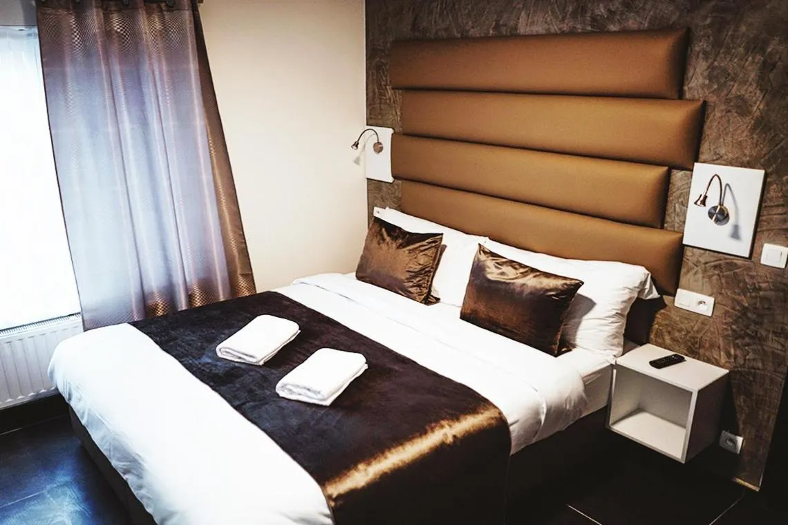 Bed in Hôtel onyx expo
