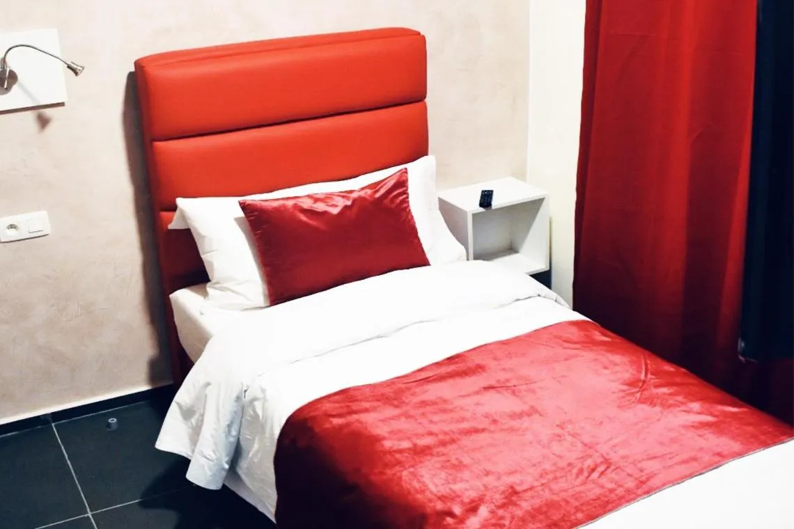 Bed in Hôtel onyx expo