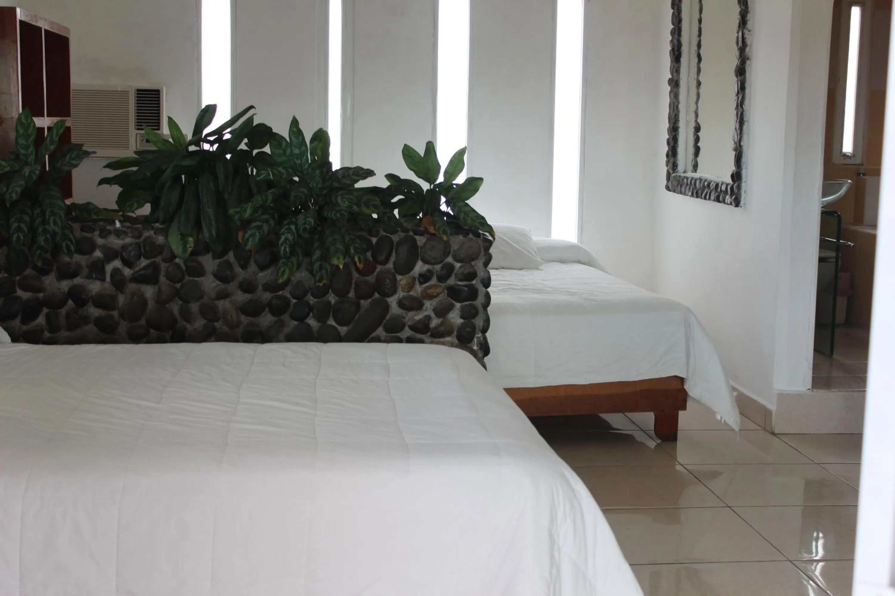 Bed in Hotel Villas del Rey