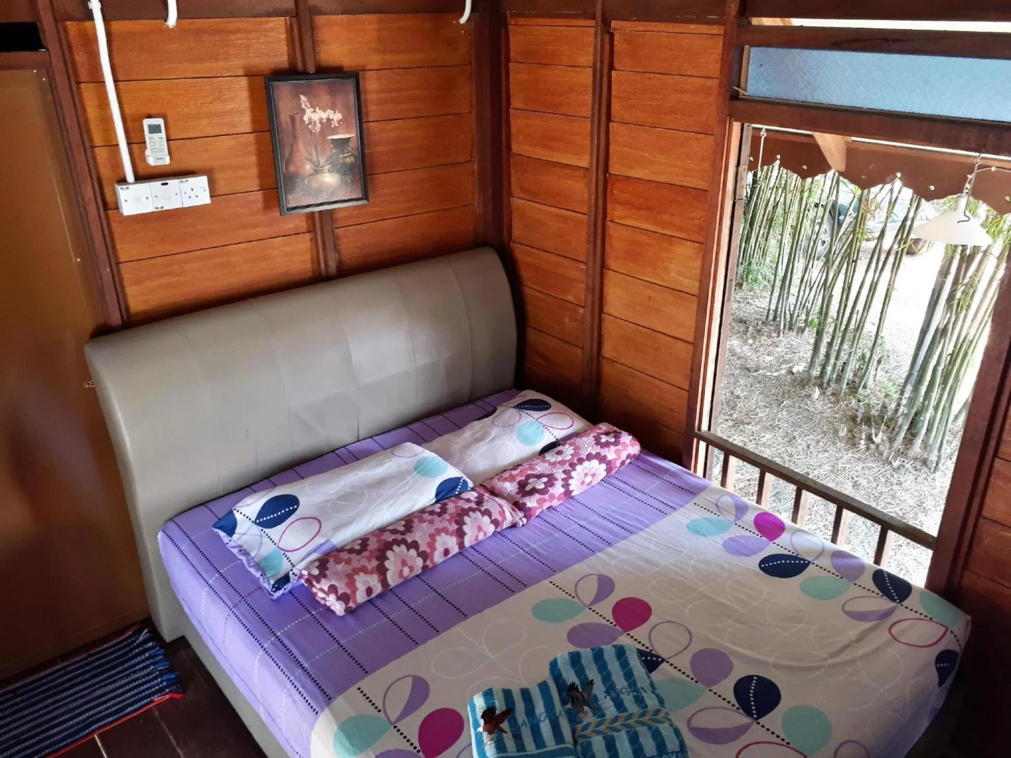 Bed in THE COTTAGE LANGKAWI