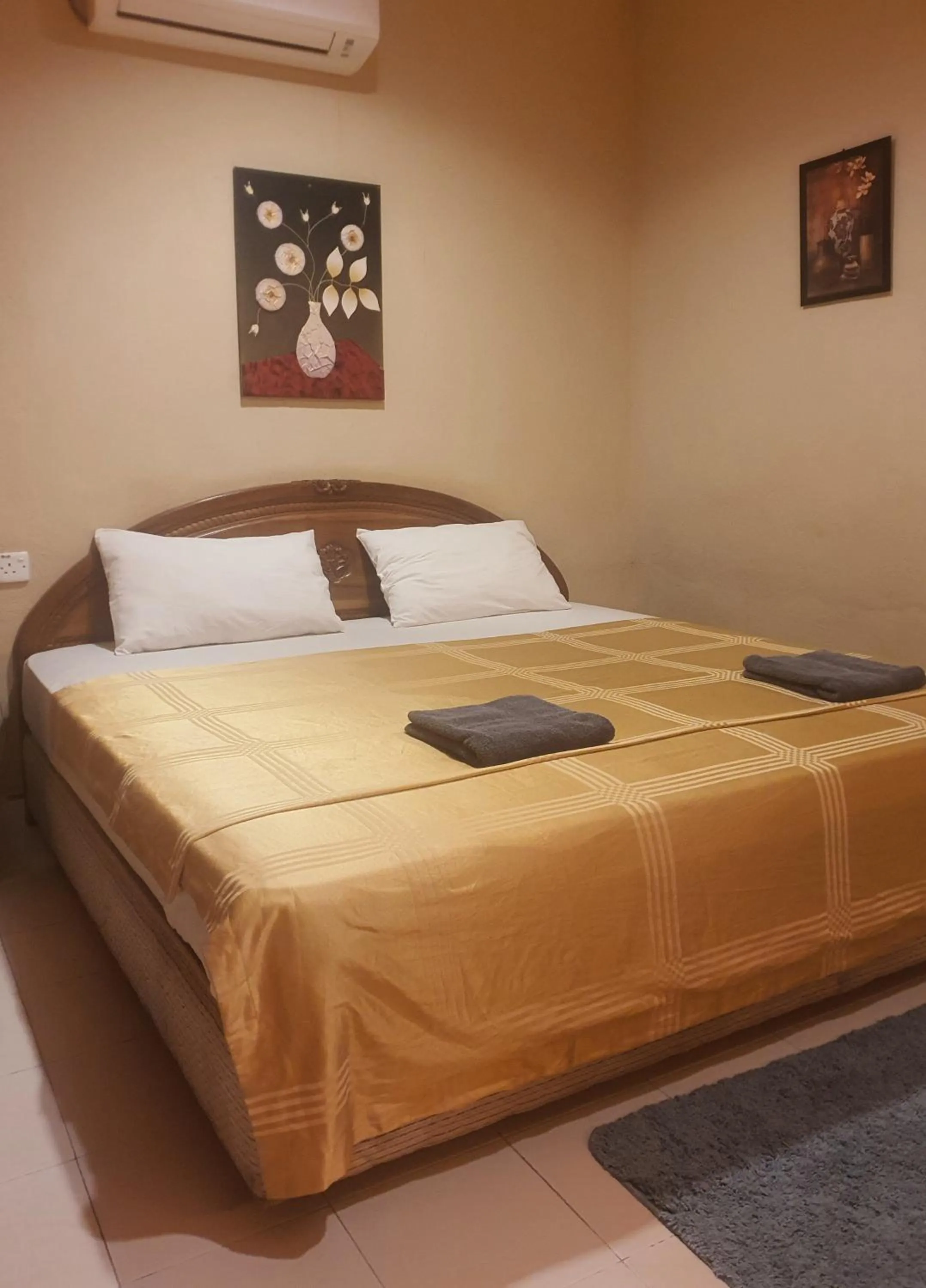 Bed in THE COTTAGE LANGKAWI