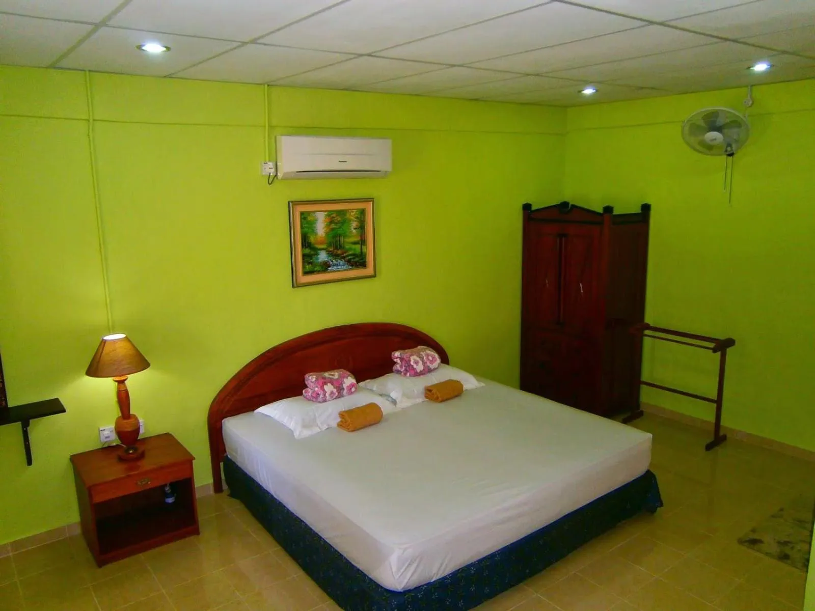 Bed in THE COTTAGE LANGKAWI