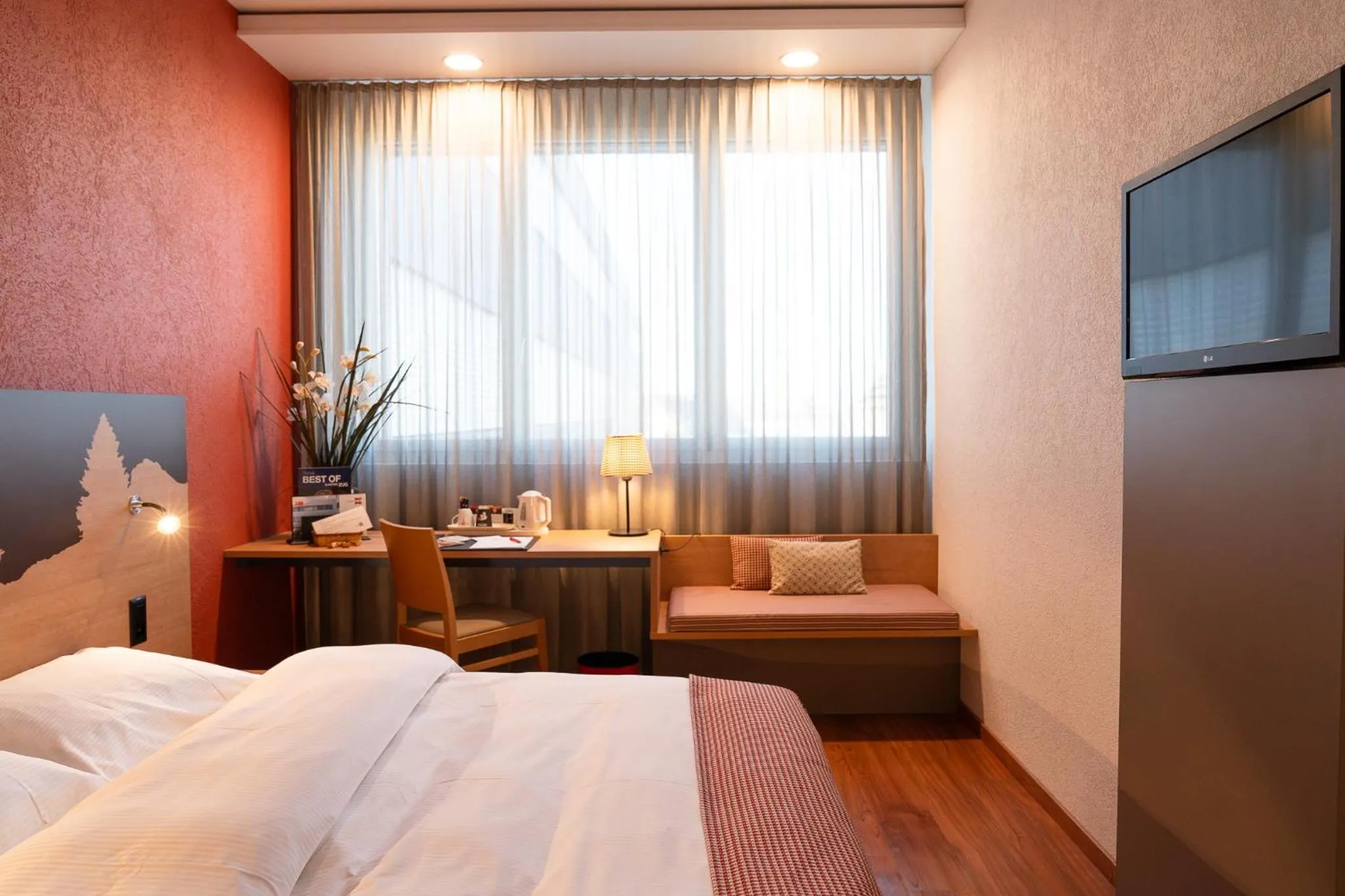 Bed in SwissEver Hotel Zug