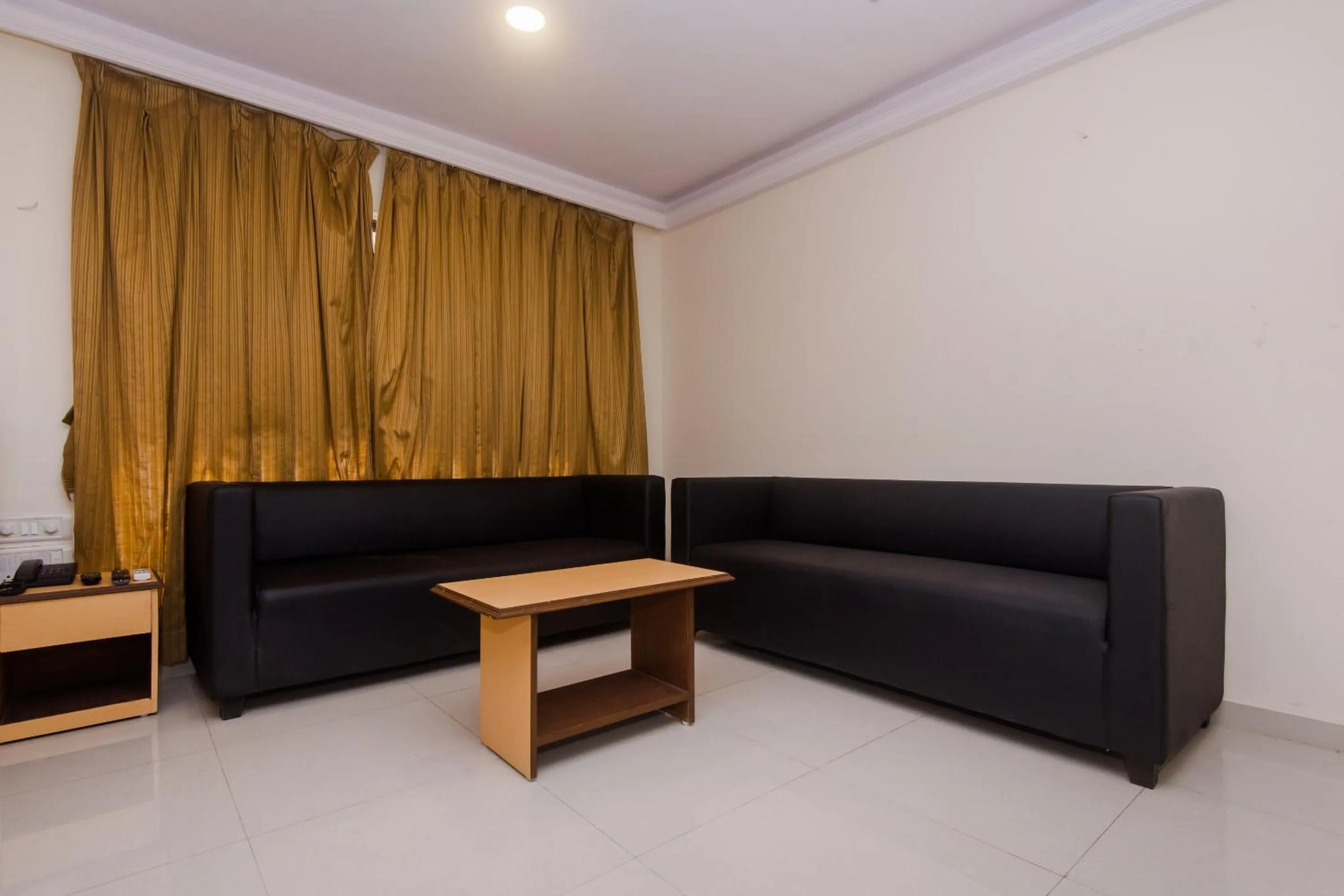 Bedroom in Capital O Orbit Inn Near Infiniti Mall