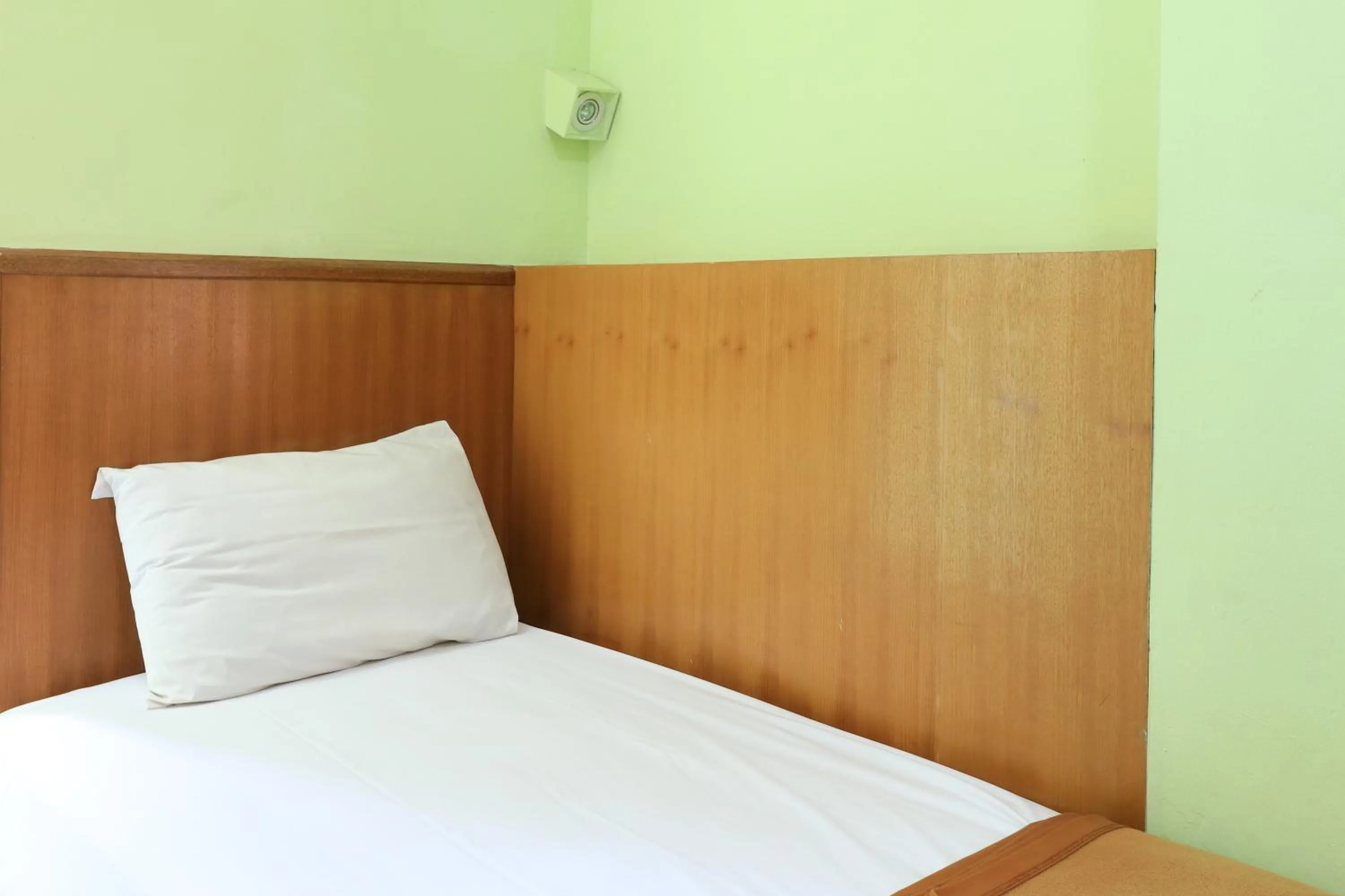 Superior Double Room in Hotel Prisma Mitra RedDoorz