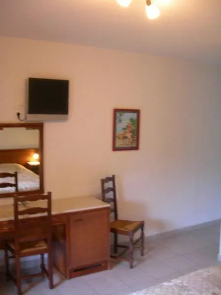 Bedroom in Hôtel de la Madeleine Anduze
