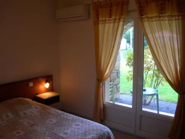 Bedroom, Bed in Hôtel de la Madeleine Anduze
