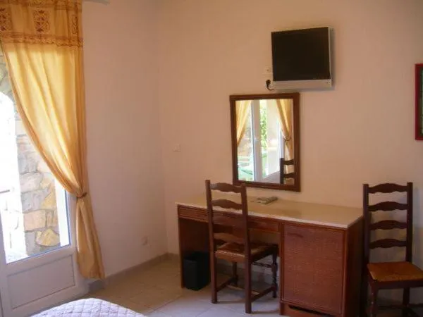 Bedroom in Hôtel de la Madeleine Anduze