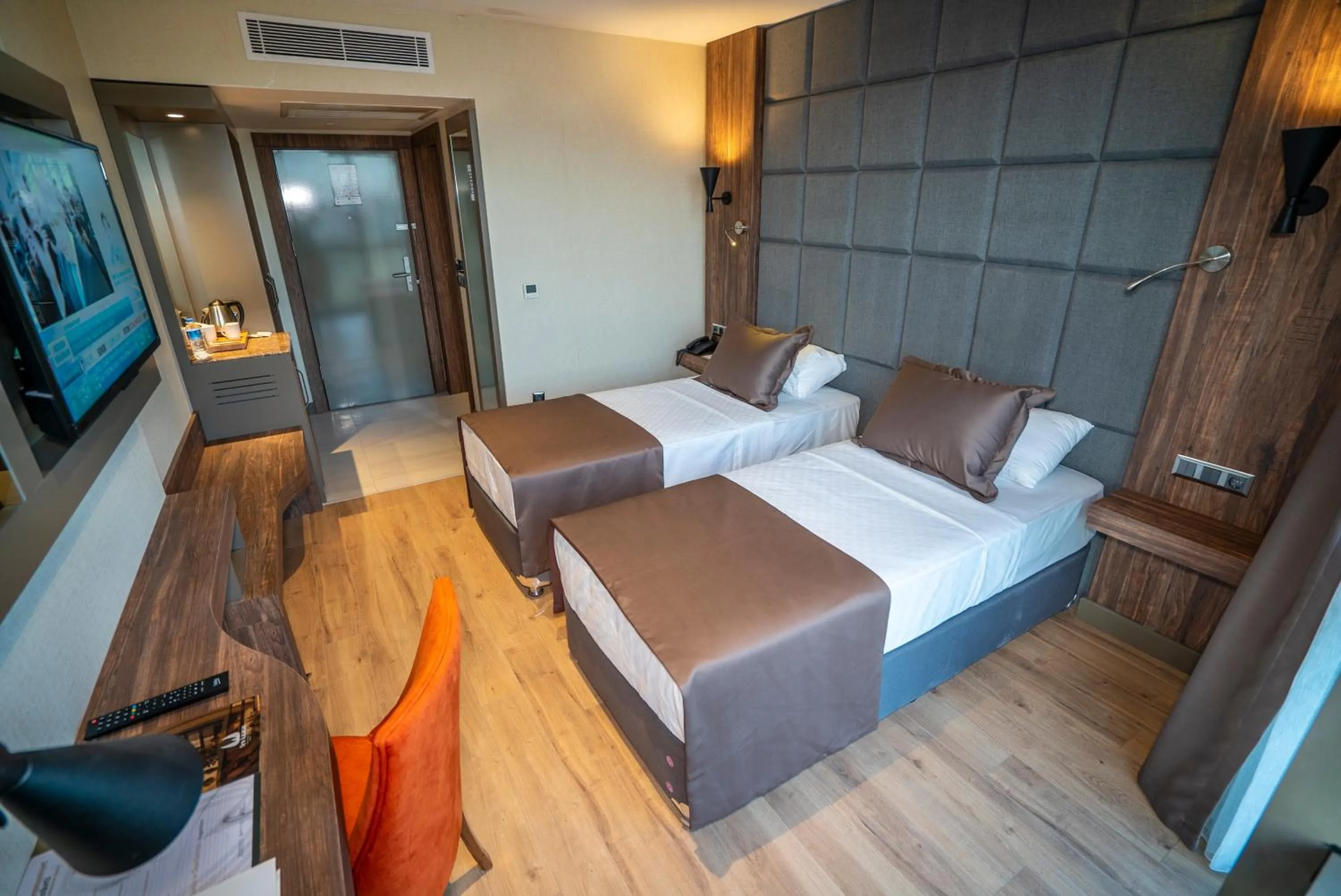 Bed in NEW KARAMAN HOTEL