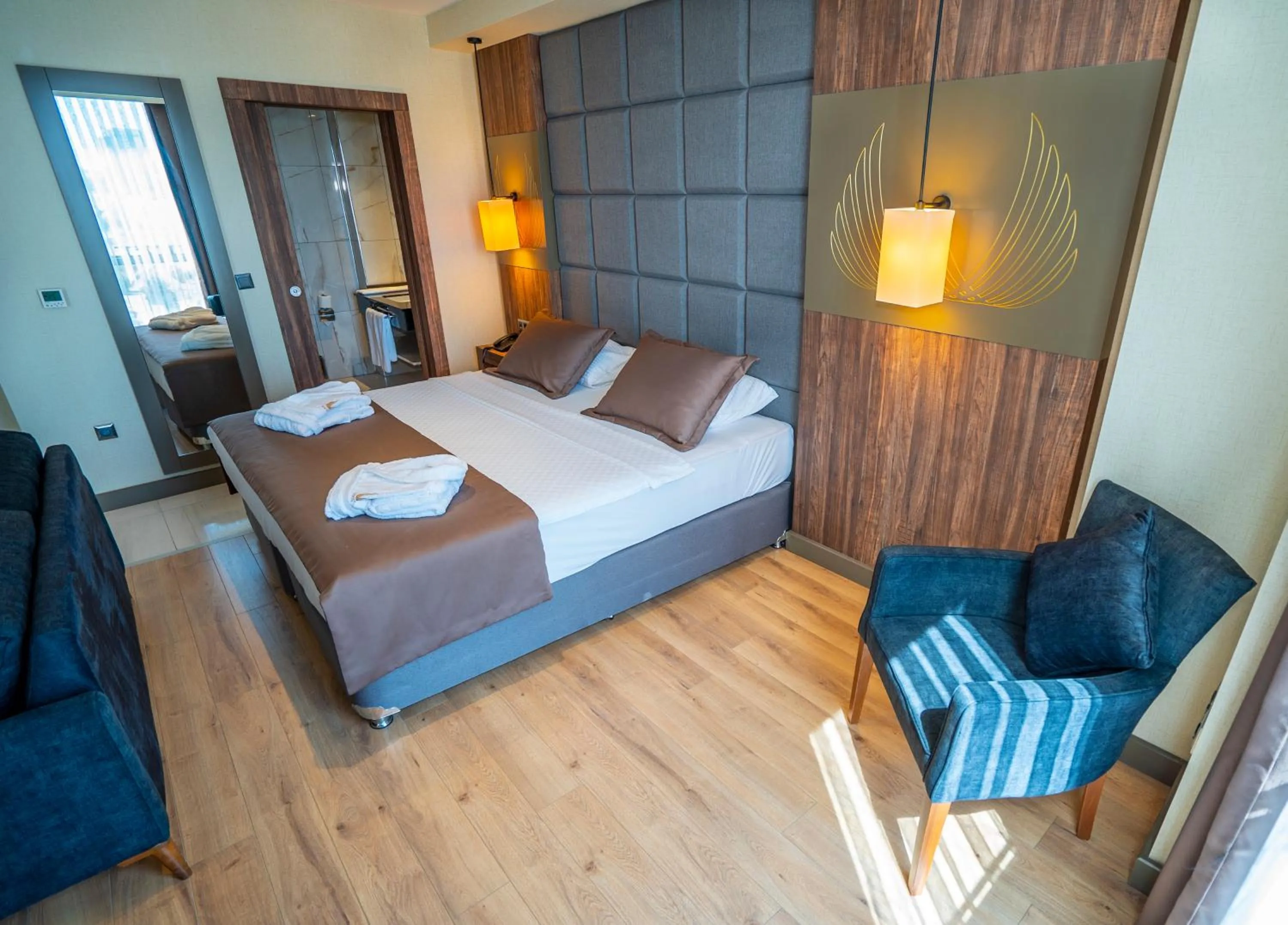 Bed in NEW KARAMAN HOTEL