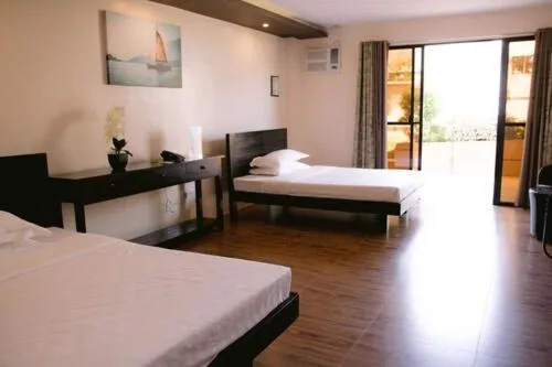 Bed in A&A Garden Suites