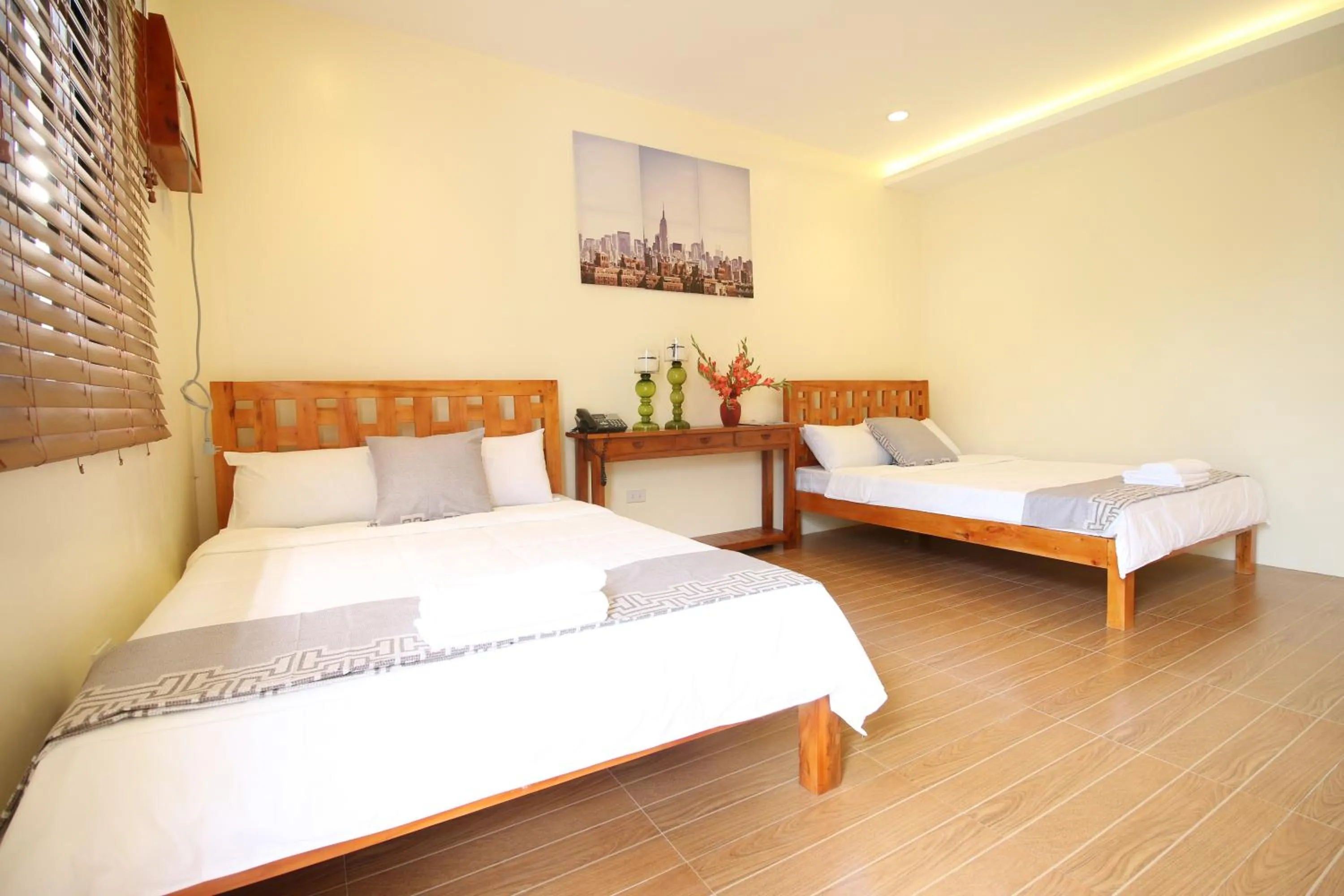 Bed in A&A Garden Suites