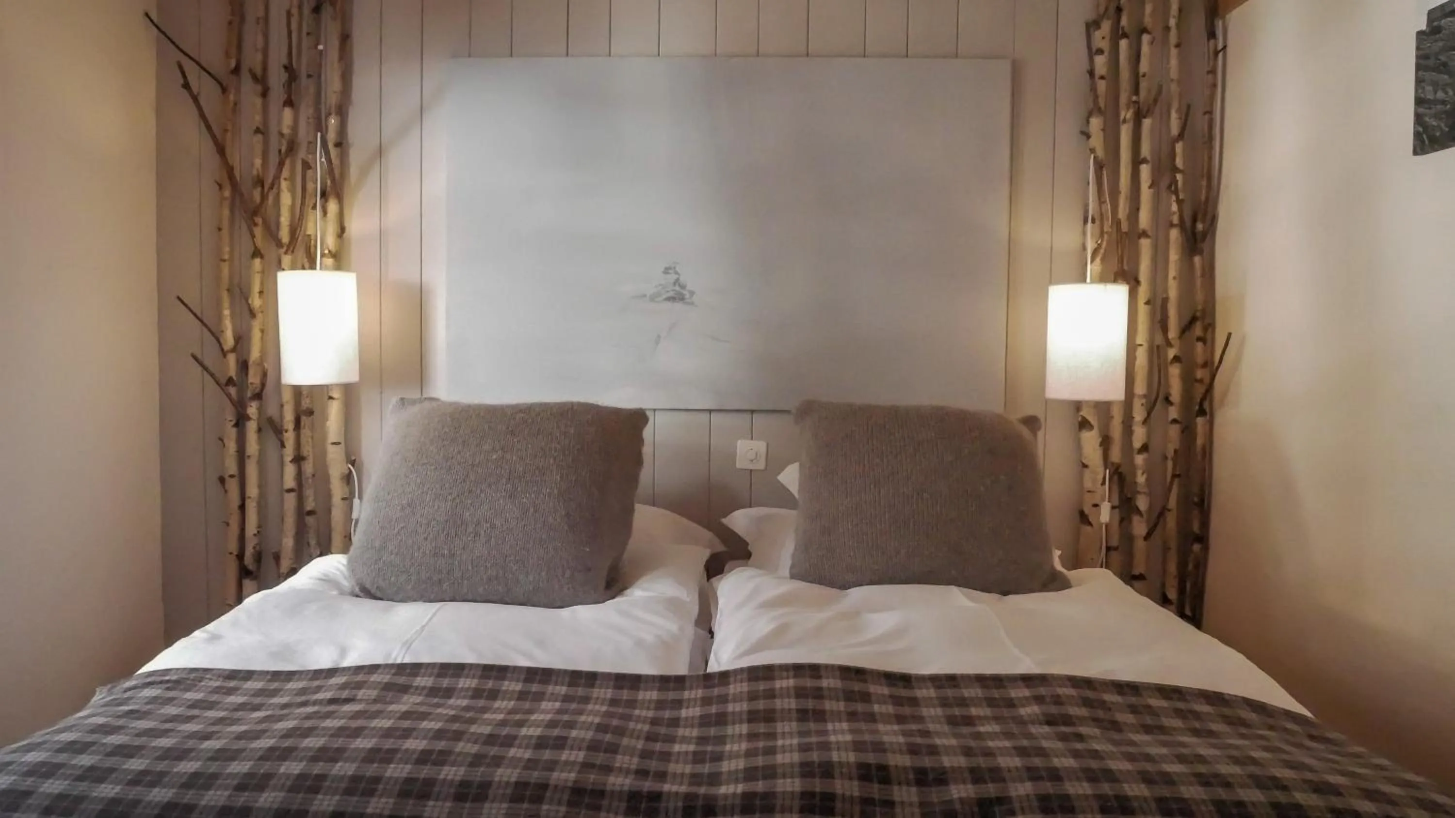 Bed in Hôtel Le Grand Chalet Favre