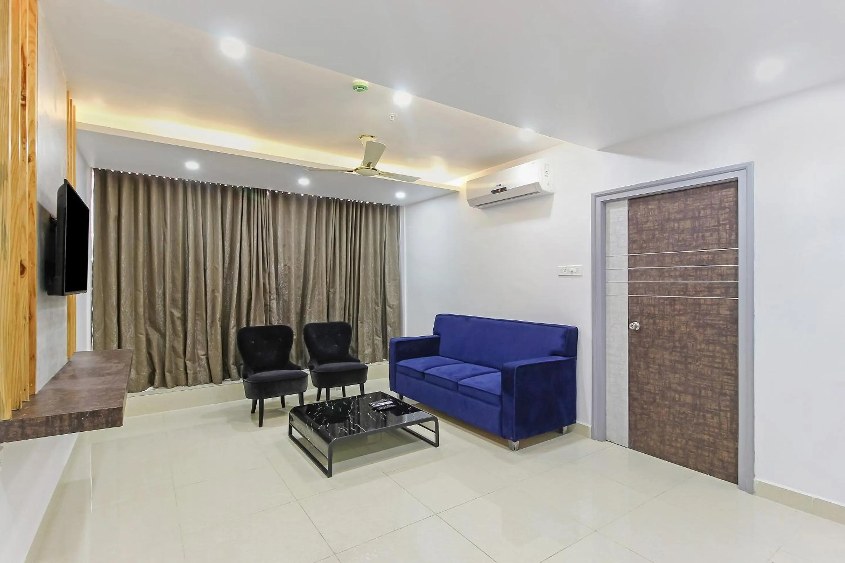 Facade/entrance in Capital O Hoysala Inn