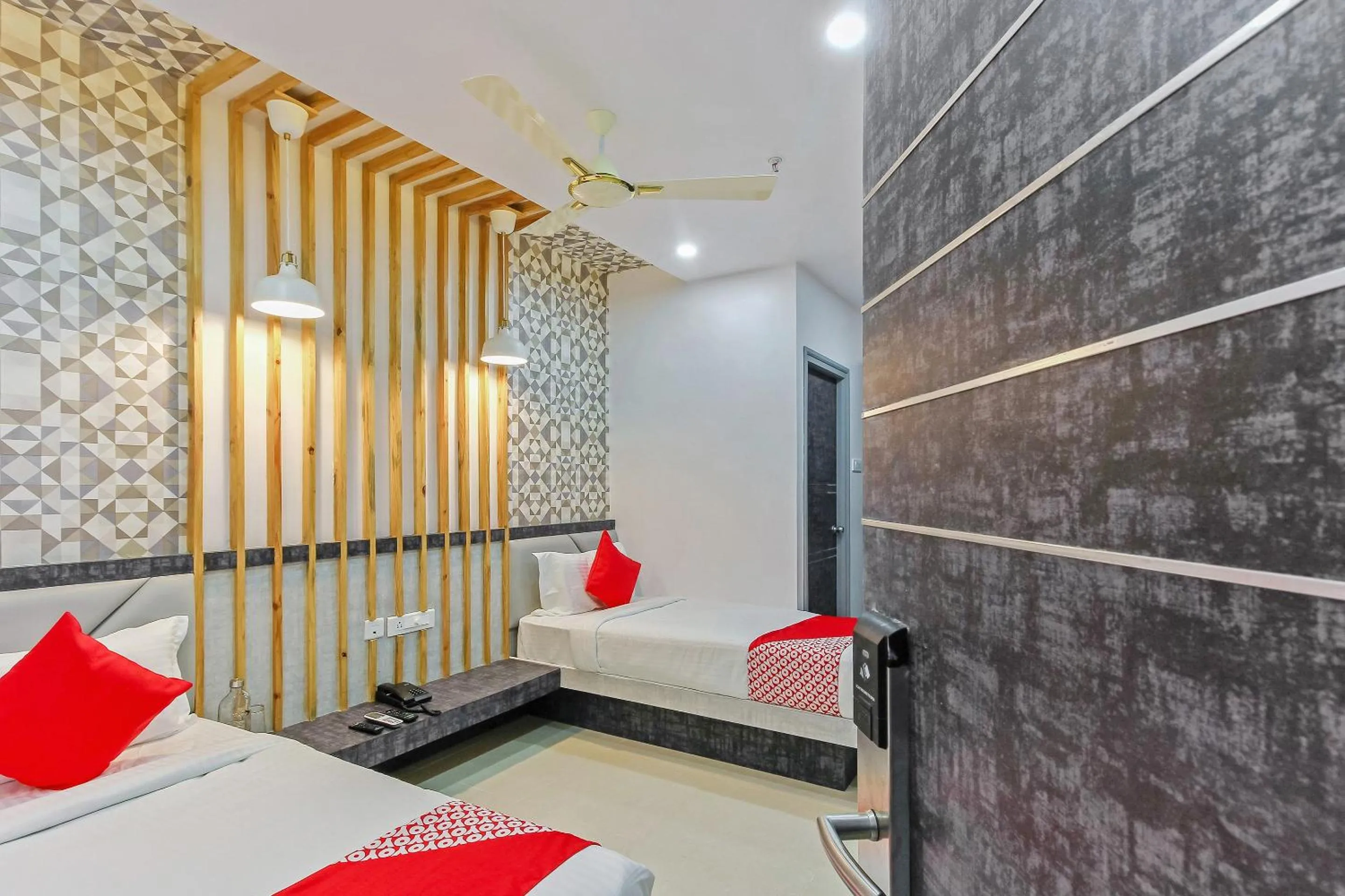 Bedroom, Bed in Capital O Hoysala Inn