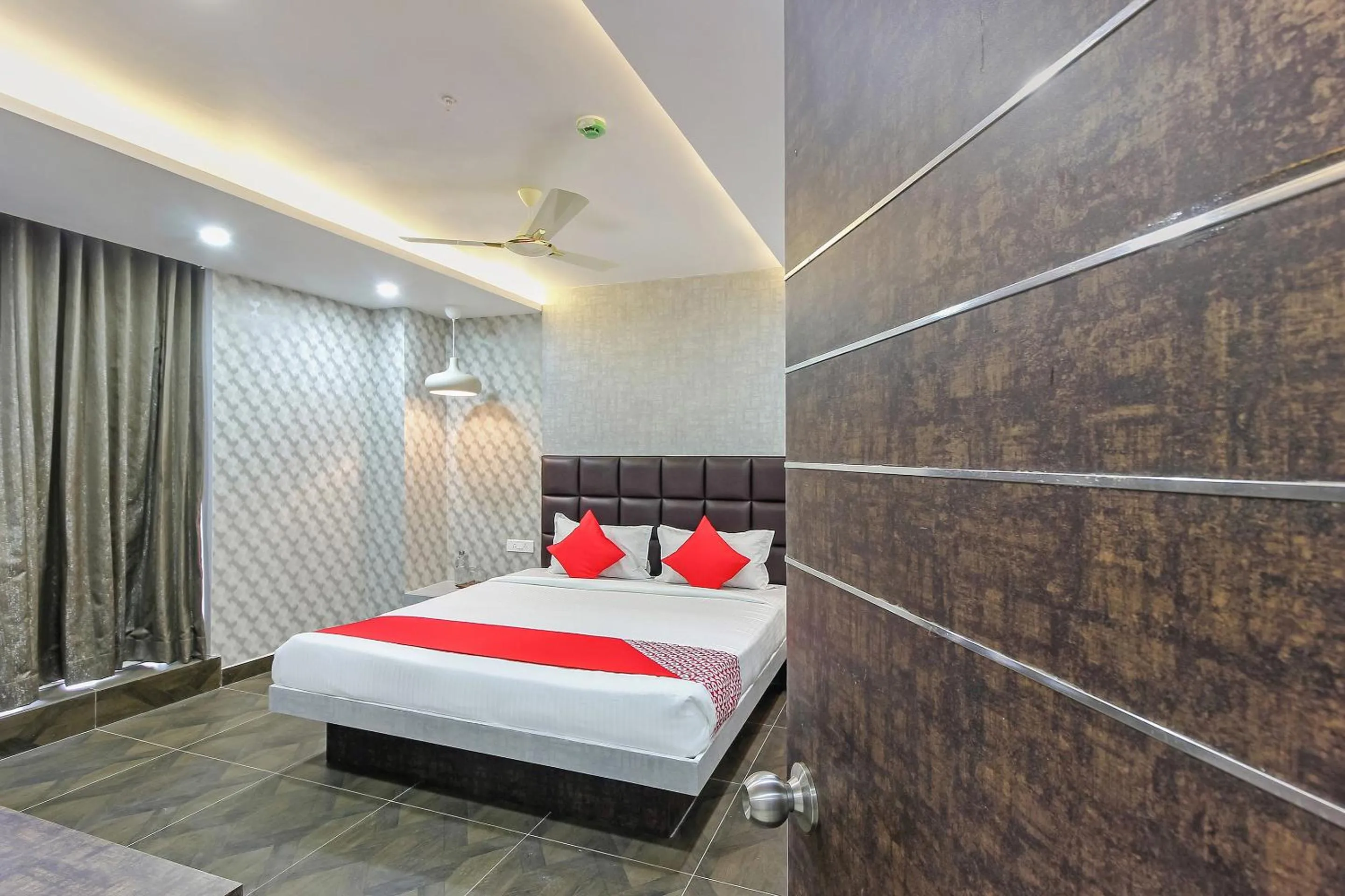 Bedroom, Bed in Capital O Hoysala Inn