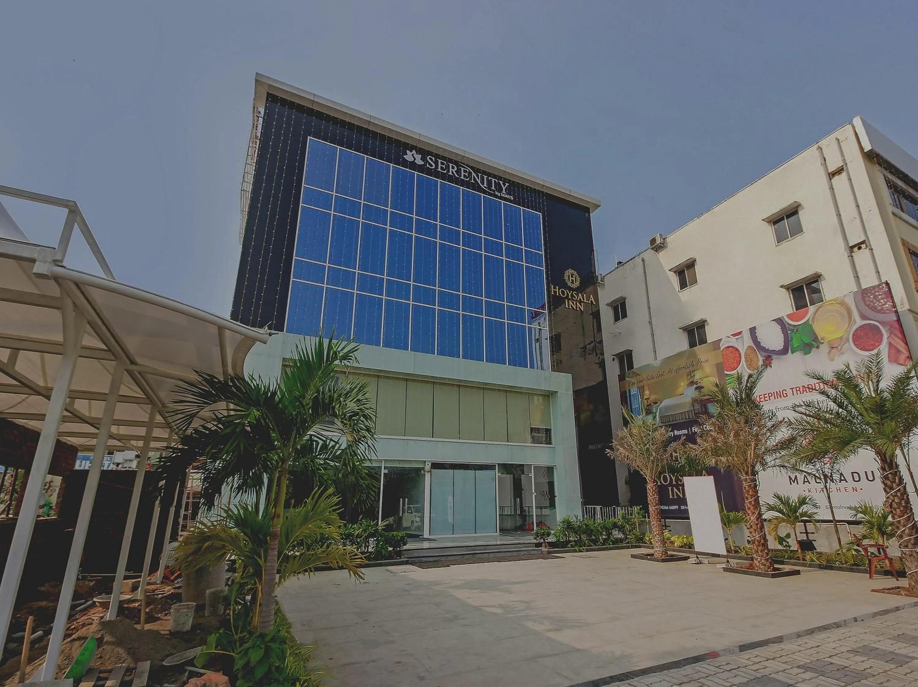 Facade/entrance in Capital O Hoysala Inn