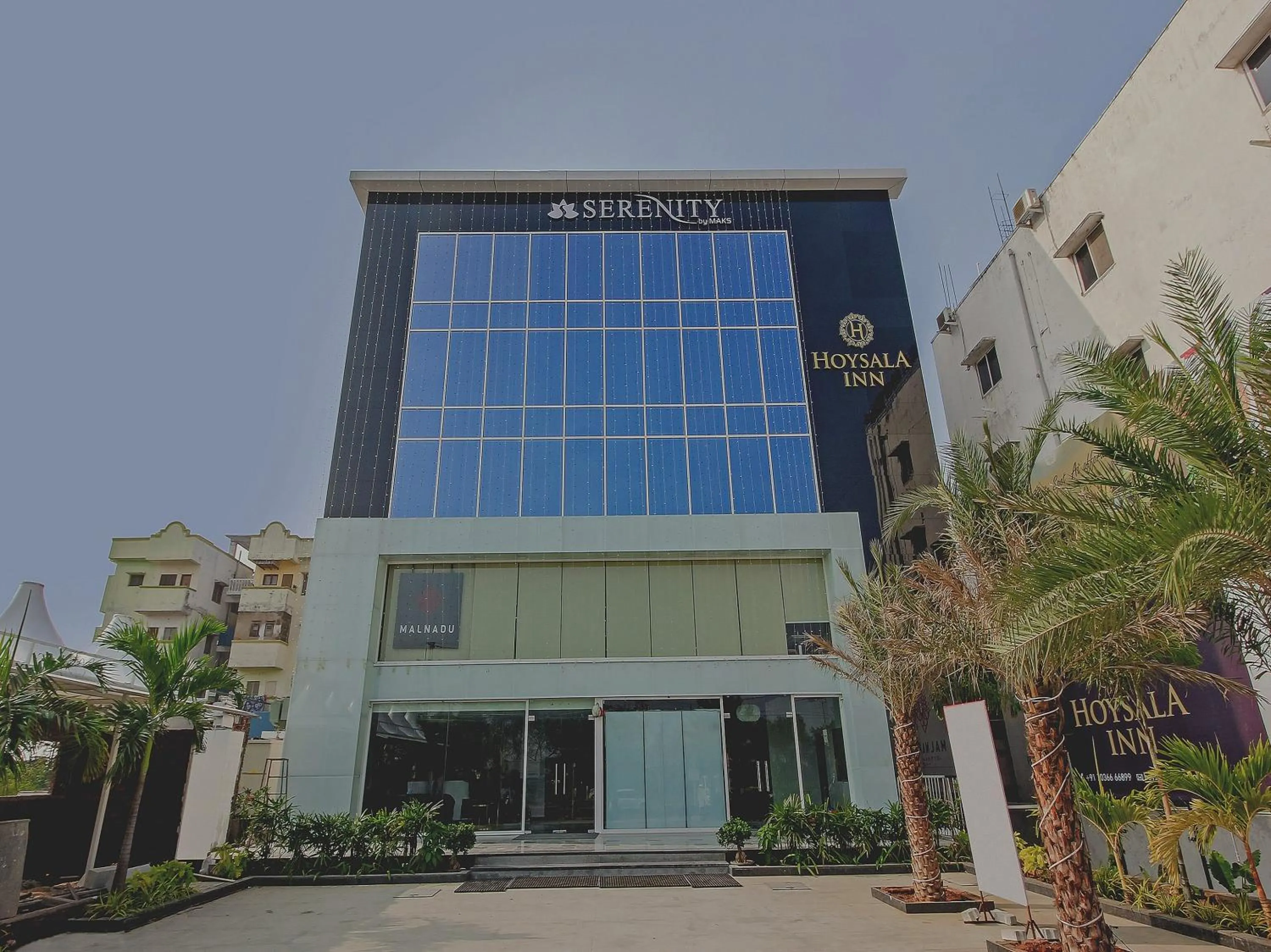 Facade/entrance in Capital O Hoysala Inn