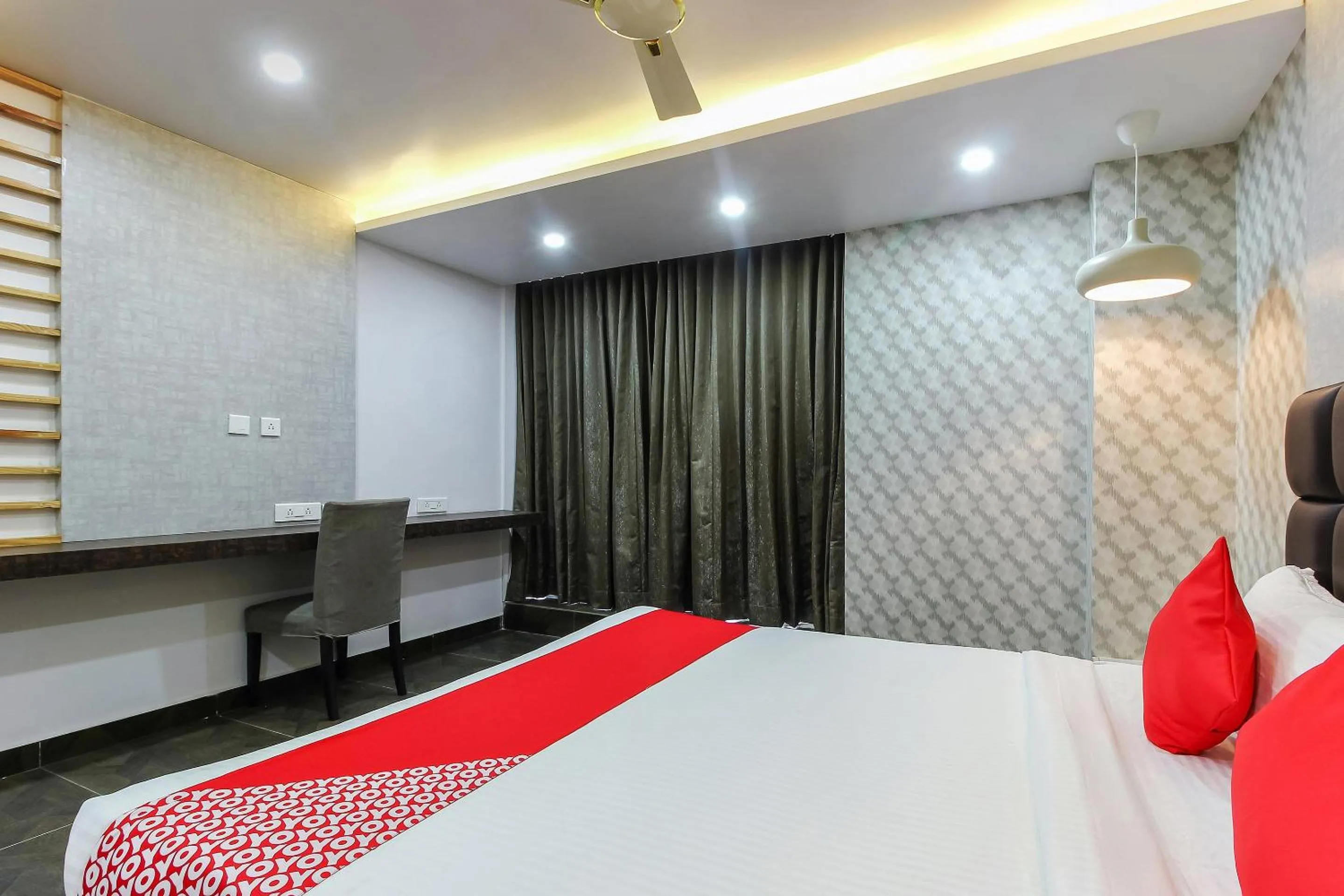 Bedroom, Bed in Capital O Hoysala Inn