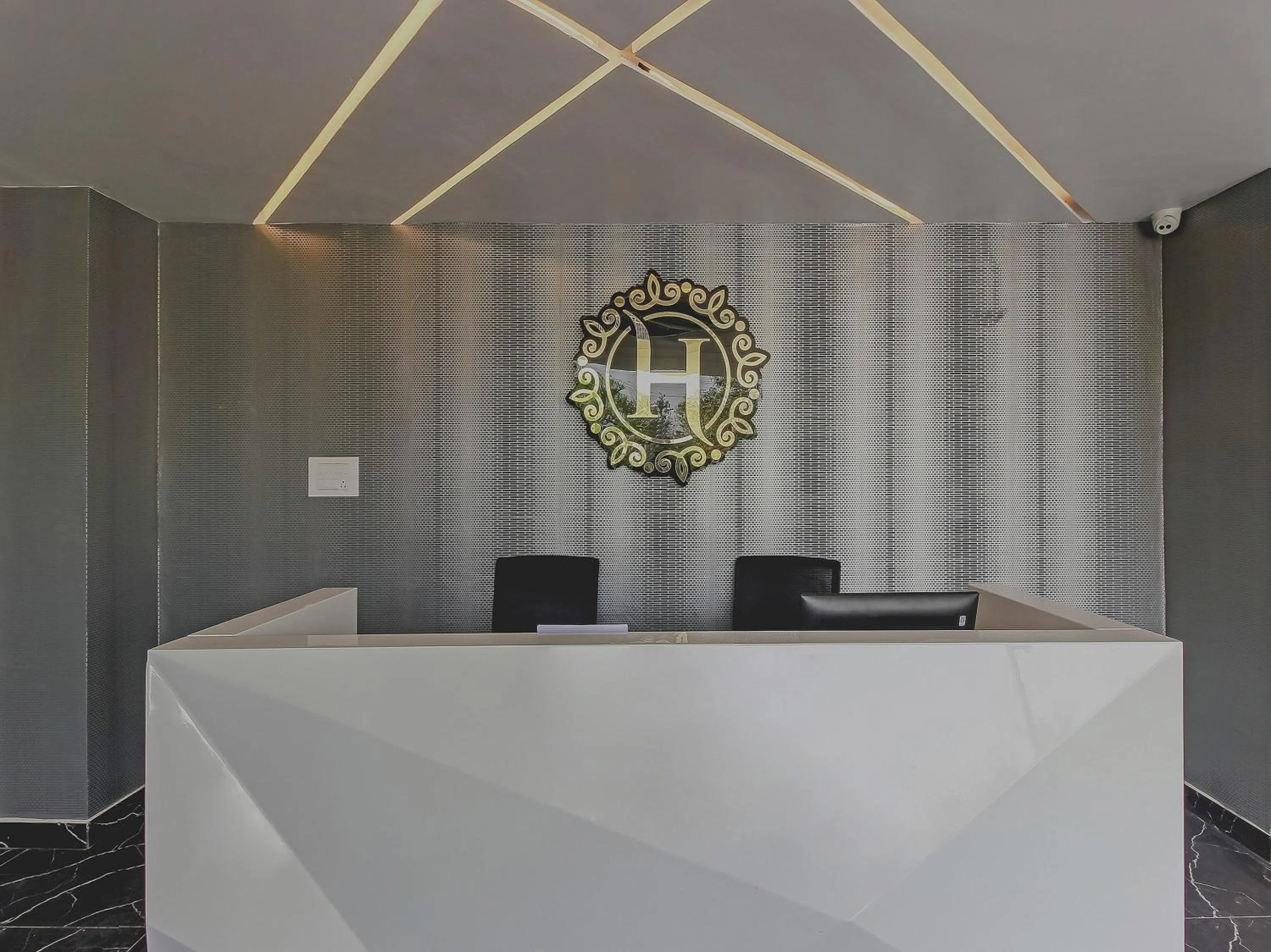 Lobby or reception in Capital O Hoysala Inn