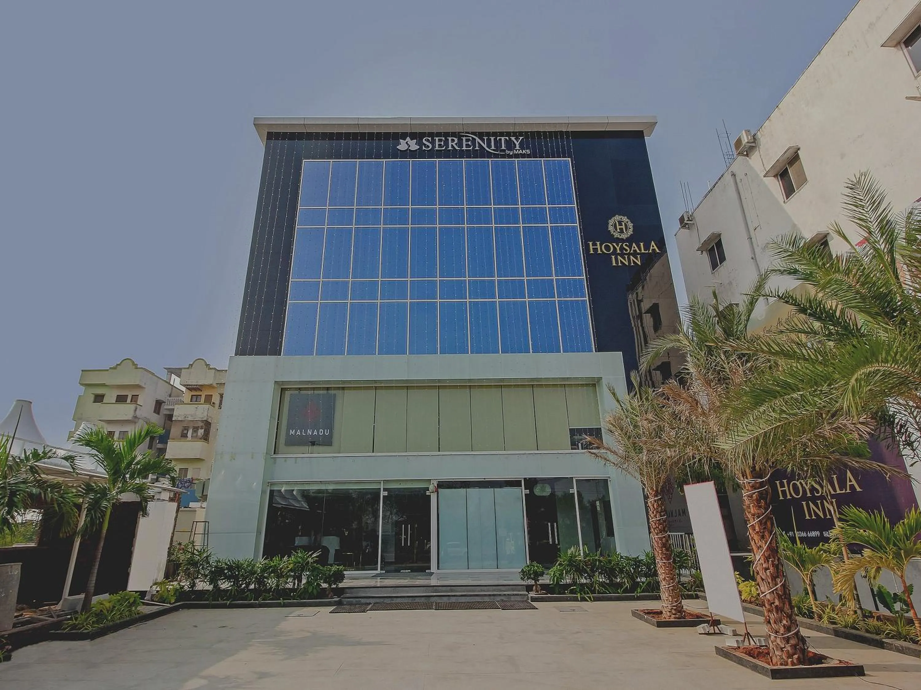 Facade/entrance in Capital O Hoysala Inn