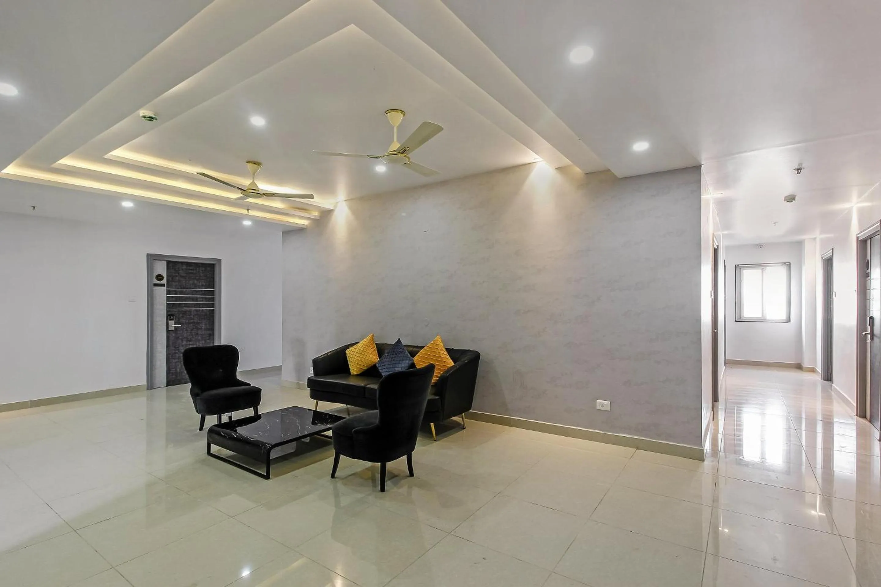 Lobby or reception in Capital O Hoysala Inn