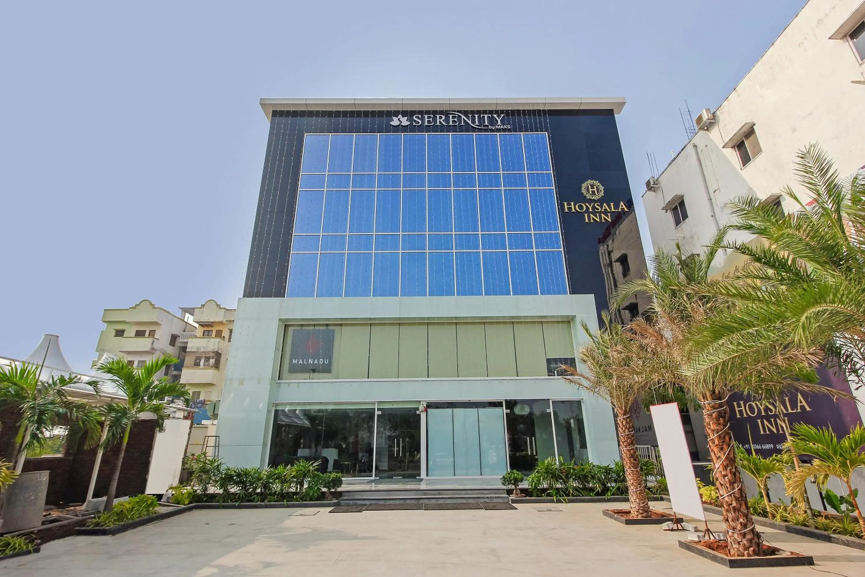 Facade/entrance in Capital O Hoysala Inn