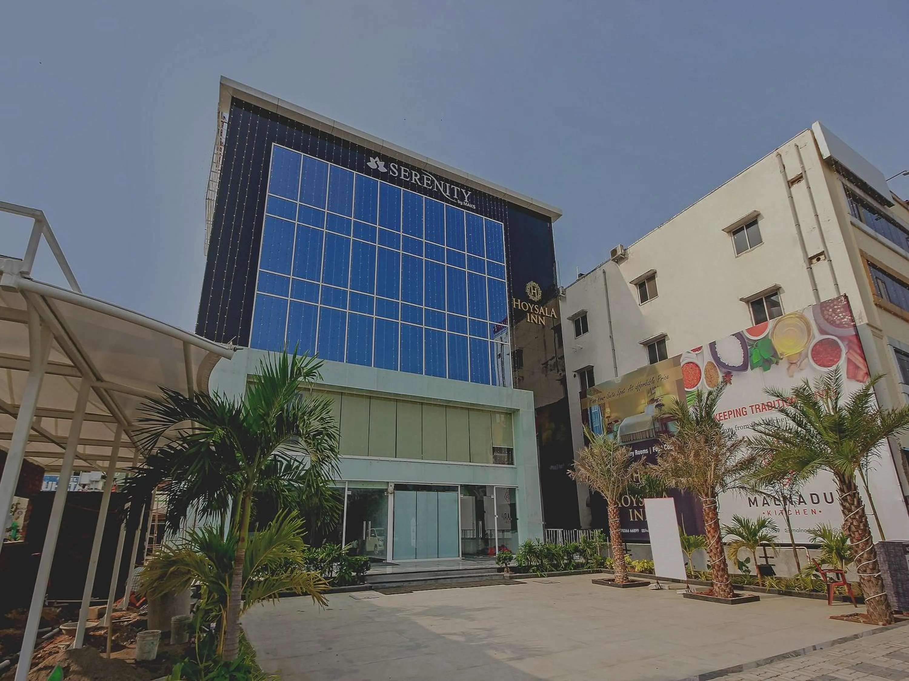 Facade/entrance in Capital O Hoysala Inn