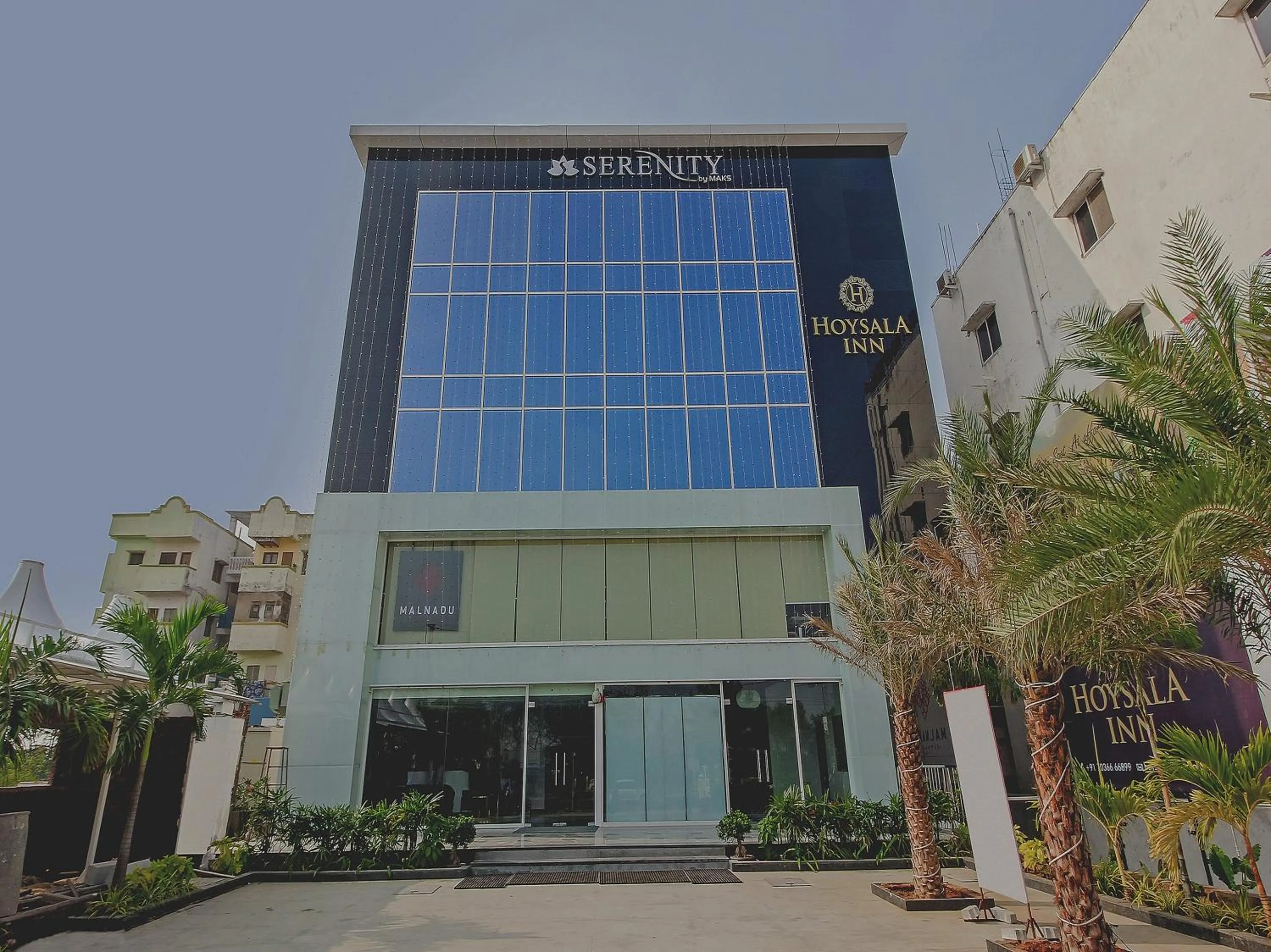 Facade/entrance in Capital O Hoysala Inn